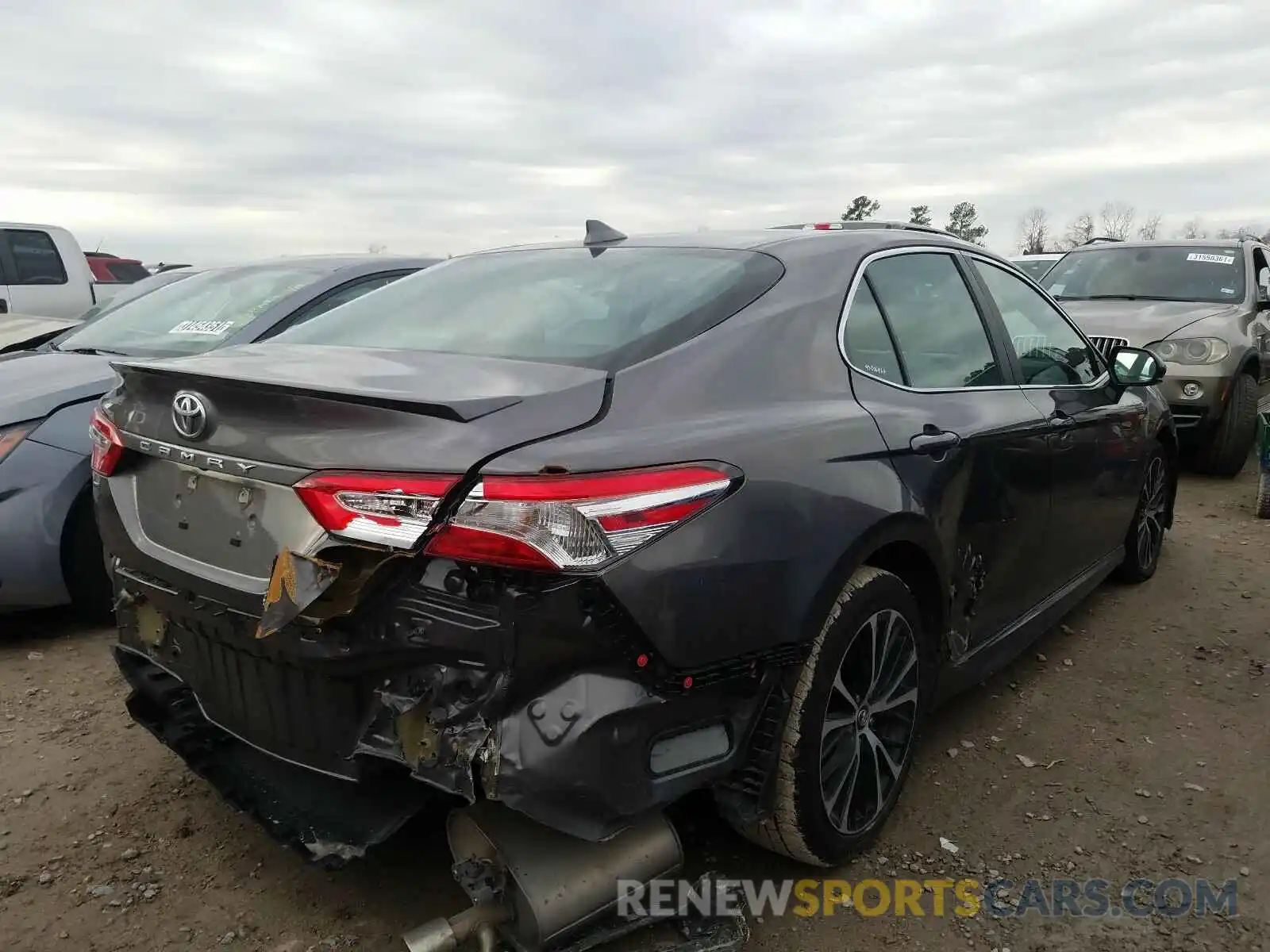 4 Photograph of a damaged car 4T1G11AK5LU304998 TOYOTA CAMRY 2020