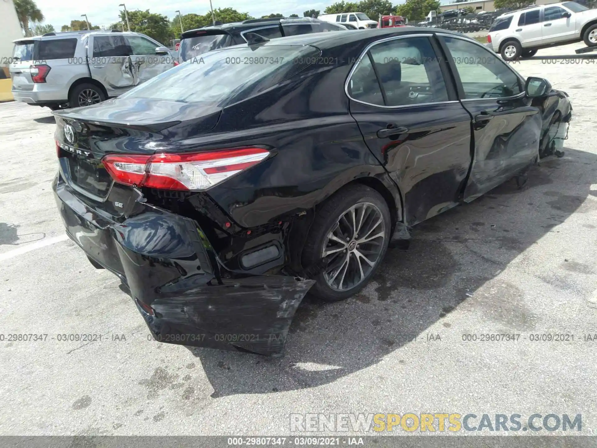 4 Photograph of a damaged car 4T1G11AK5LU947433 TOYOTA CAMRY 2020