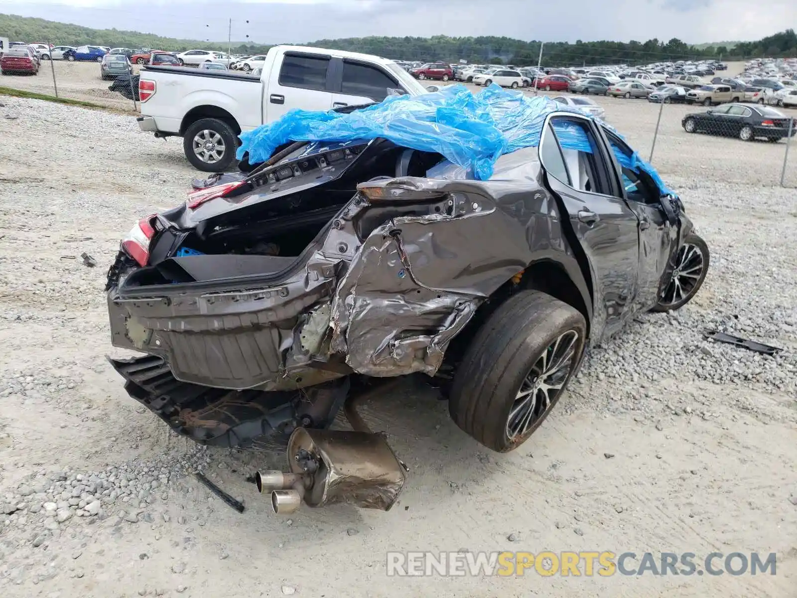 4 Photograph of a damaged car 4T1G11AK5LU962871 TOYOTA CAMRY 2020