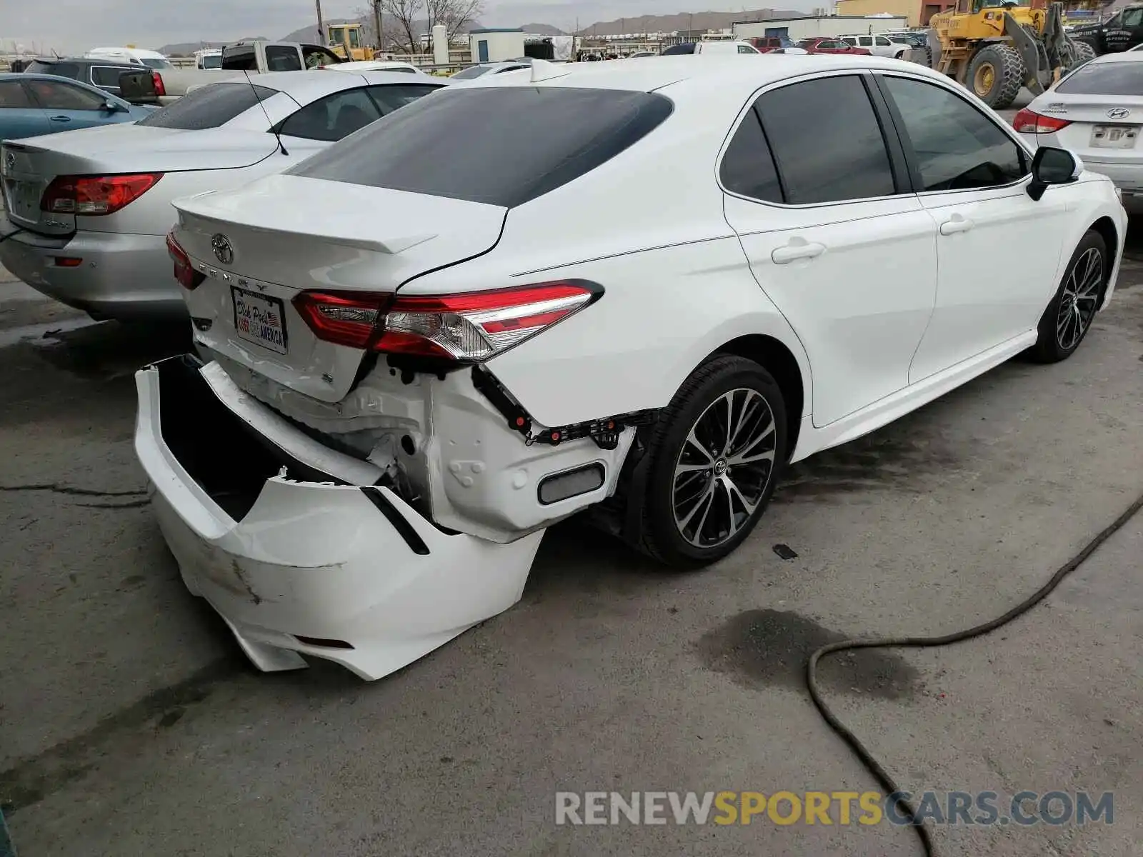 4 Photograph of a damaged car 4T1G11AK6LU899425 TOYOTA CAMRY 2020