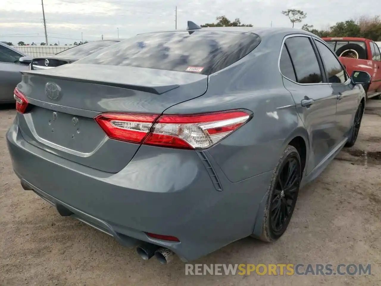 4 Photograph of a damaged car 4T1G11AK6LU899909 TOYOTA CAMRY 2020