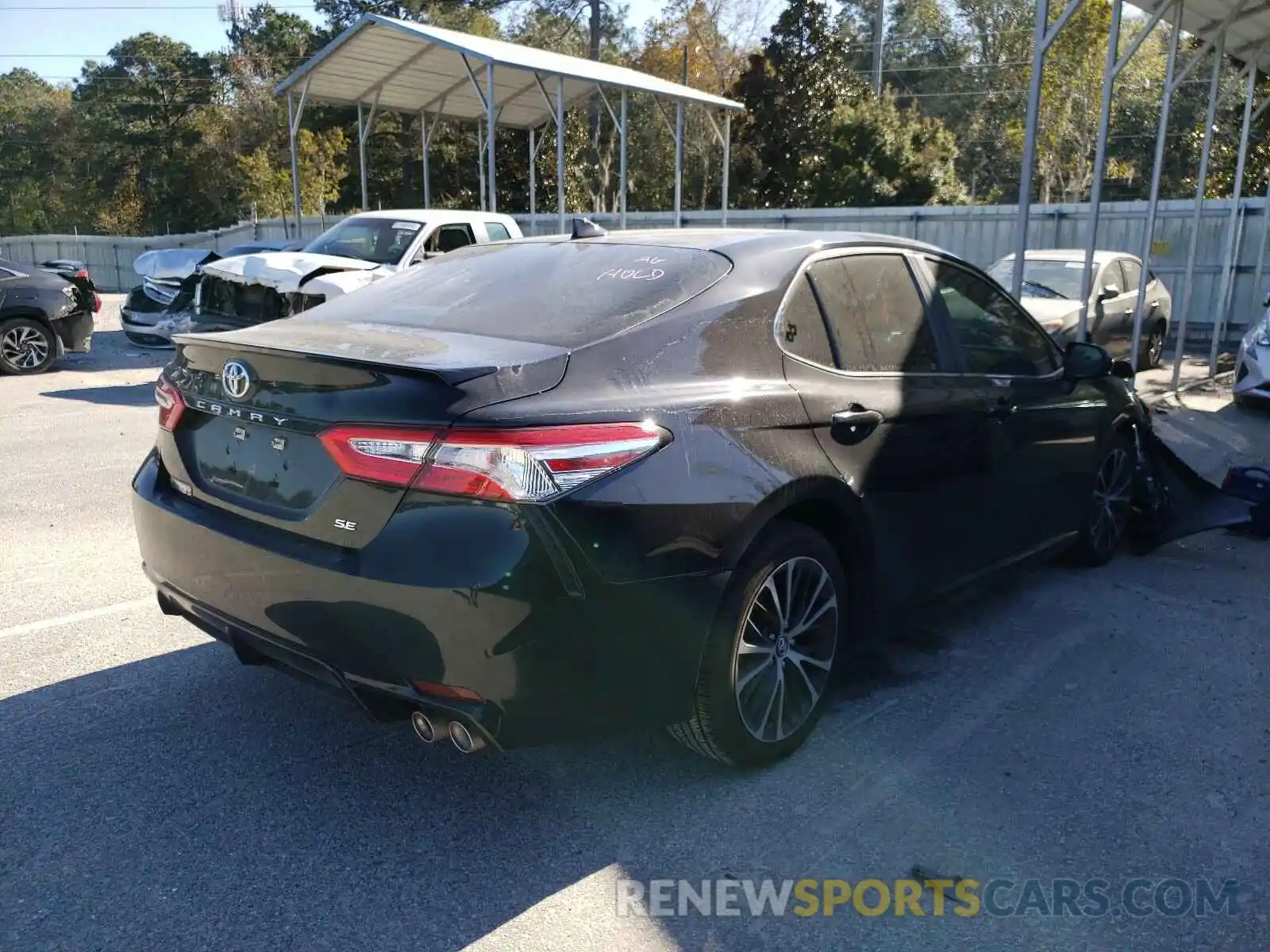 4 Photograph of a damaged car 4T1G11AK6LU935999 TOYOTA CAMRY 2020