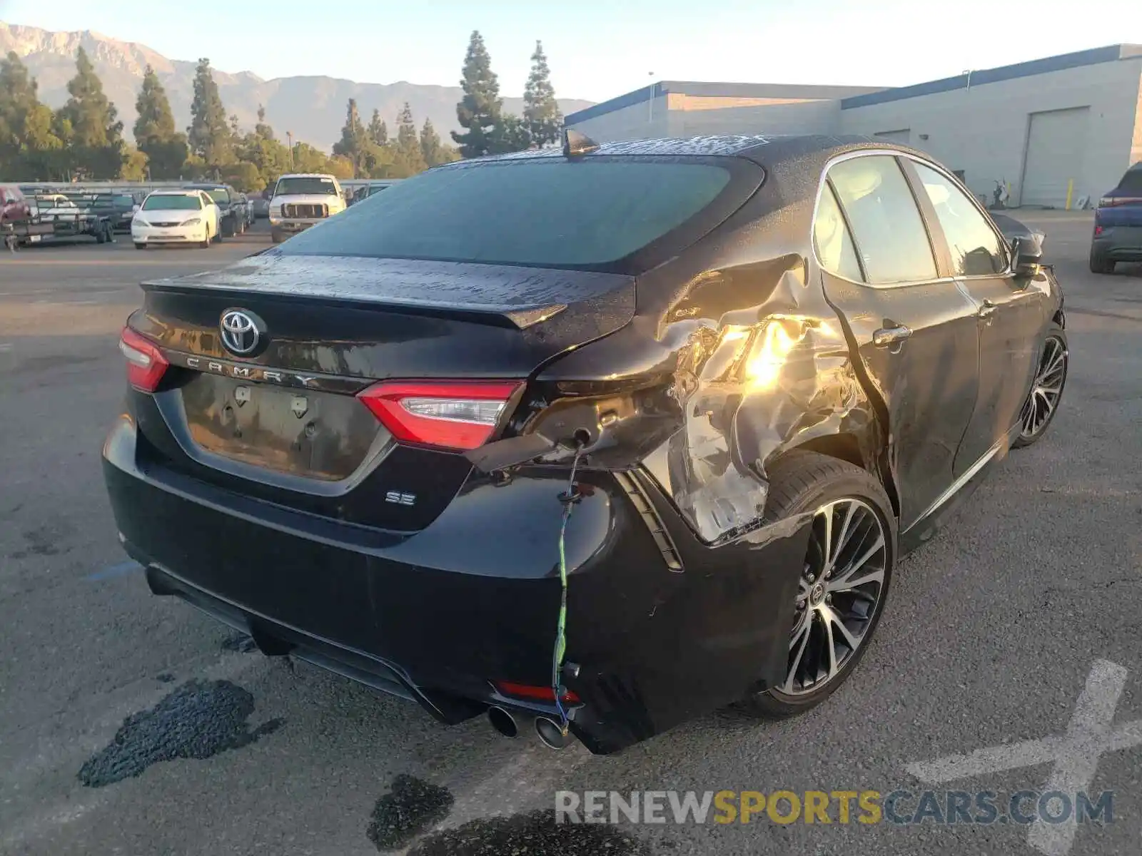 4 Photograph of a damaged car 4T1G11AK6LU965908 TOYOTA CAMRY 2020