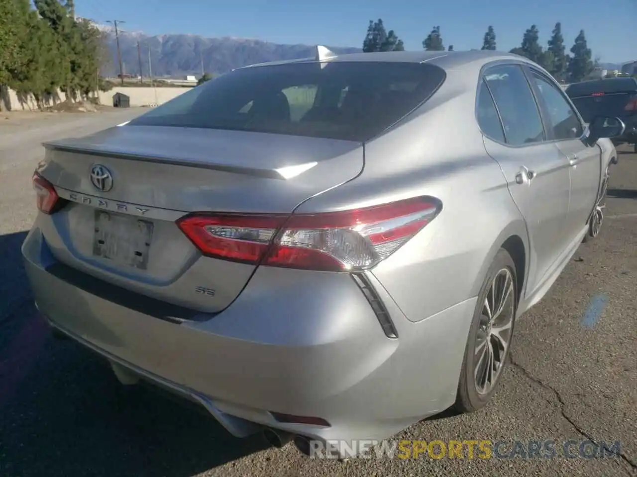 4 Photograph of a damaged car 4T1G11AK6LU996818 TOYOTA CAMRY 2020