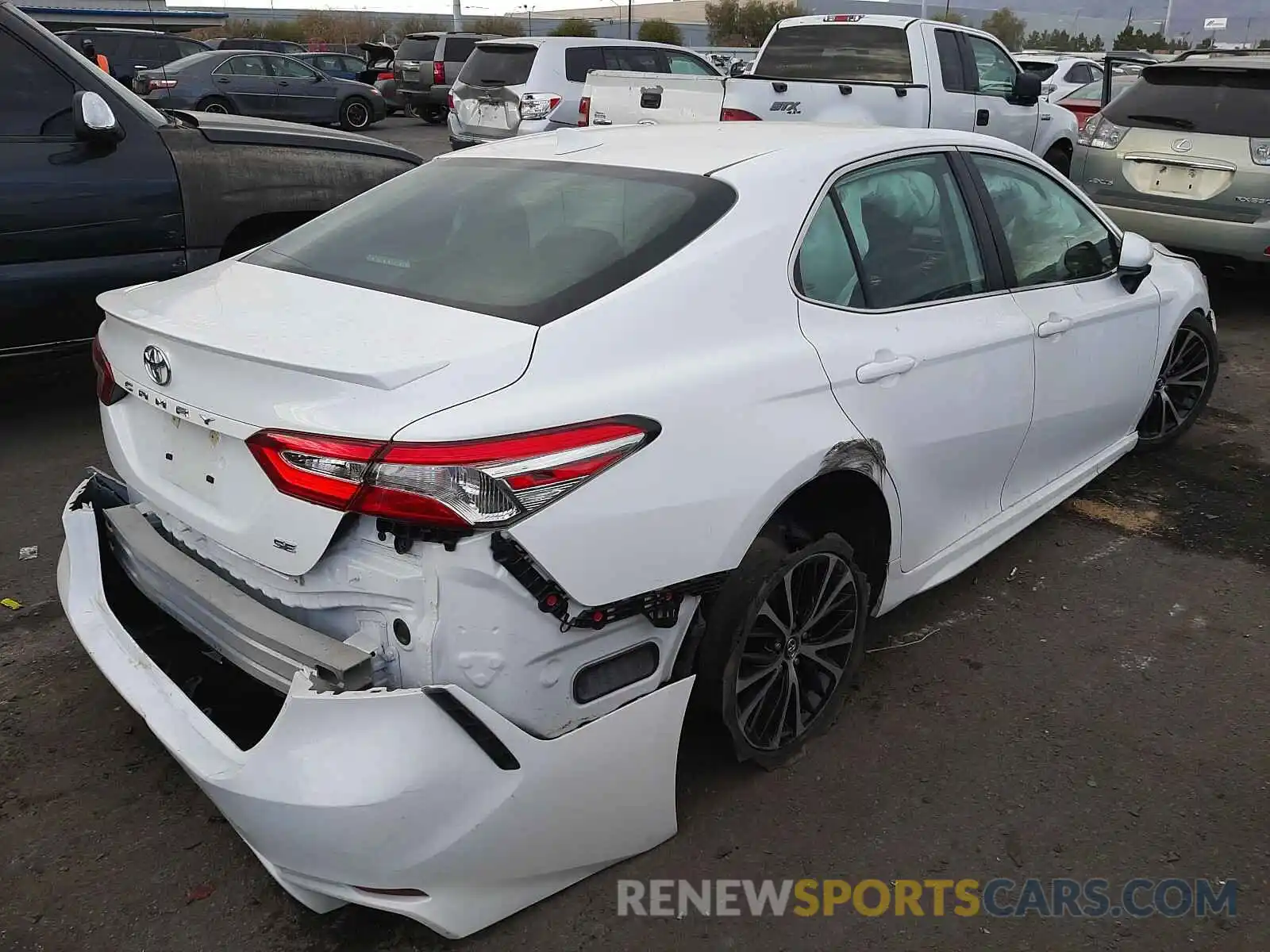 4 Photograph of a damaged car 4T1G11AK7LU306557 TOYOTA CAMRY 2020