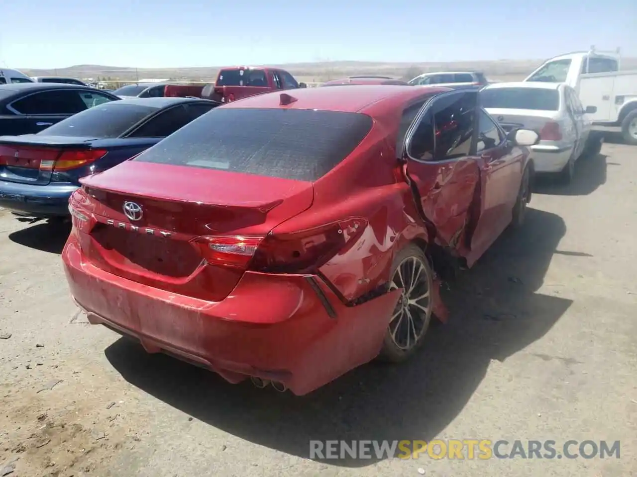 4 Photograph of a damaged car 4T1G11AK7LU316974 TOYOTA CAMRY 2020