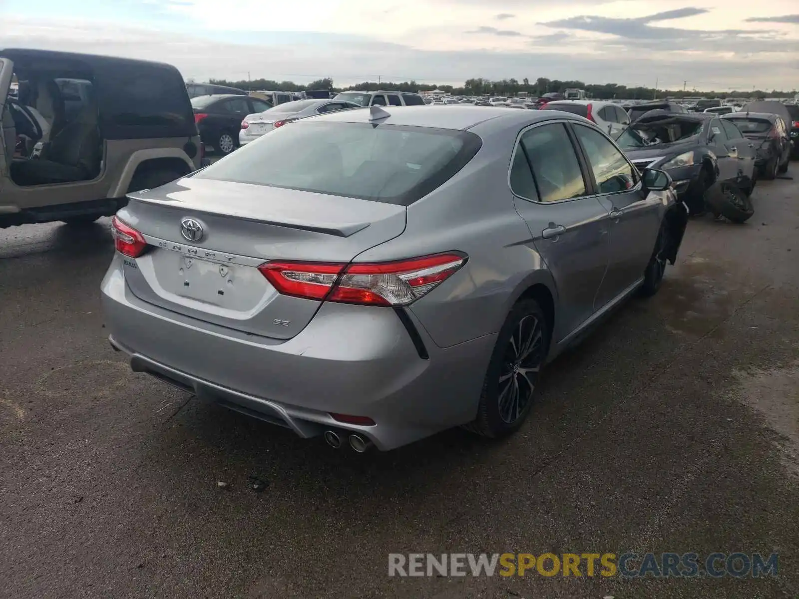 4 Photograph of a damaged car 4T1G11AK7LU335931 TOYOTA CAMRY 2020