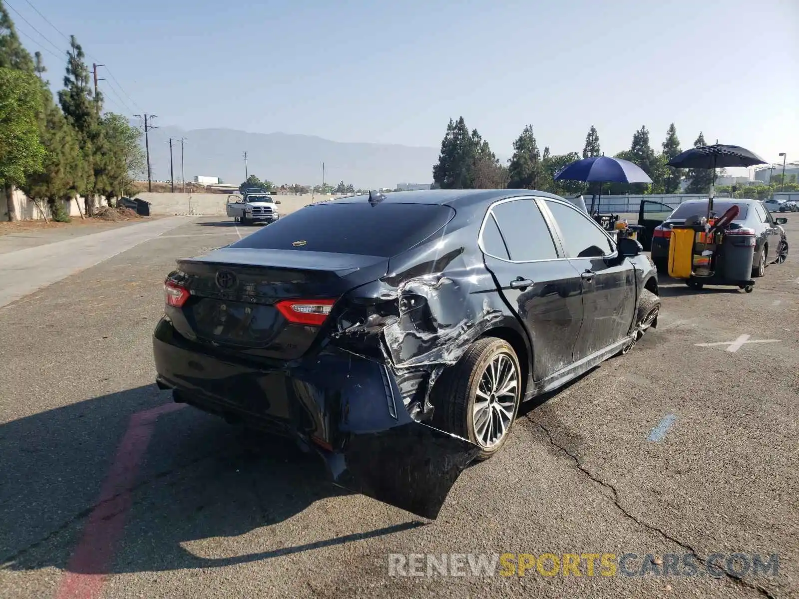 4 Photograph of a damaged car 4T1G11AK7LU350011 TOYOTA CAMRY 2020