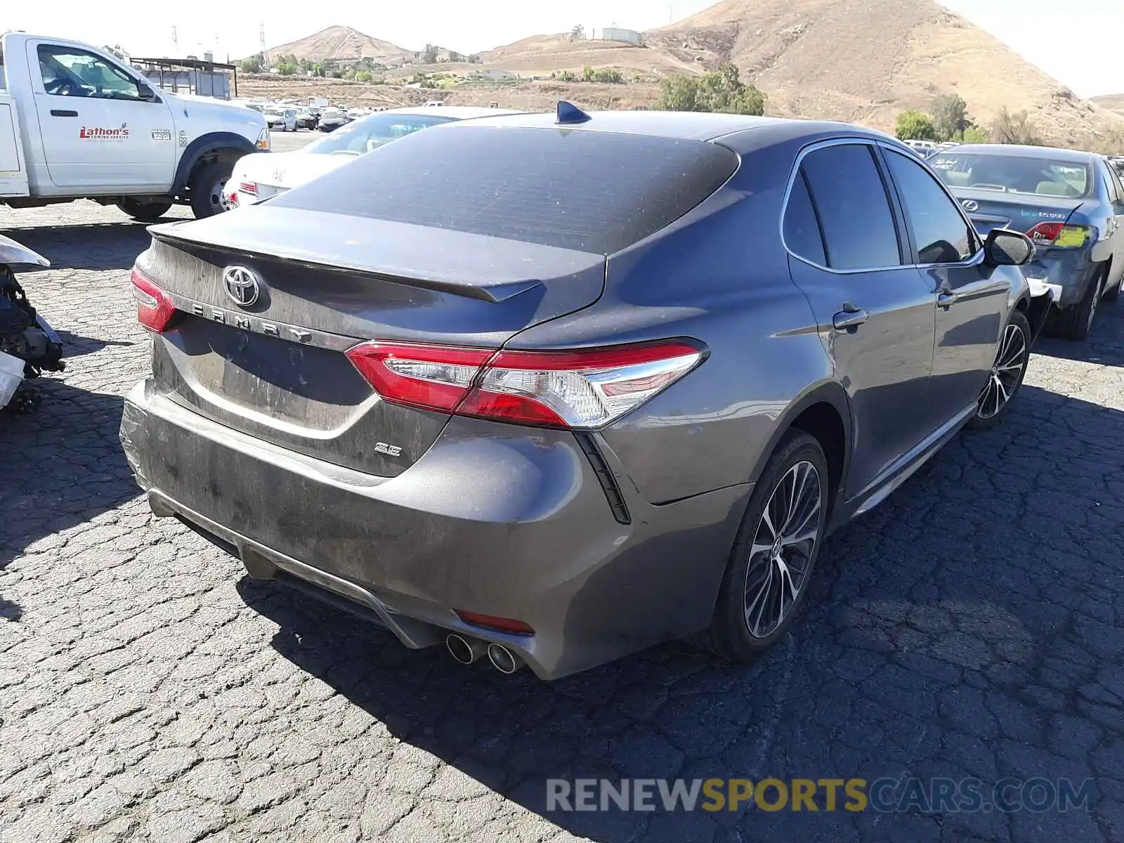 4 Photograph of a damaged car 4T1G11AK7LU909136 TOYOTA CAMRY 2020