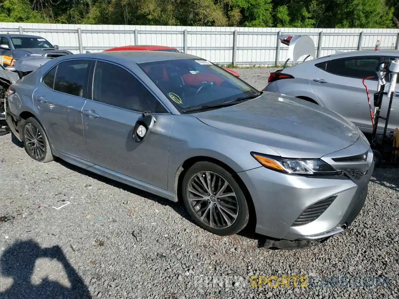 4 Photograph of a damaged car 4T1G11AK7LU931010 TOYOTA CAMRY 2020