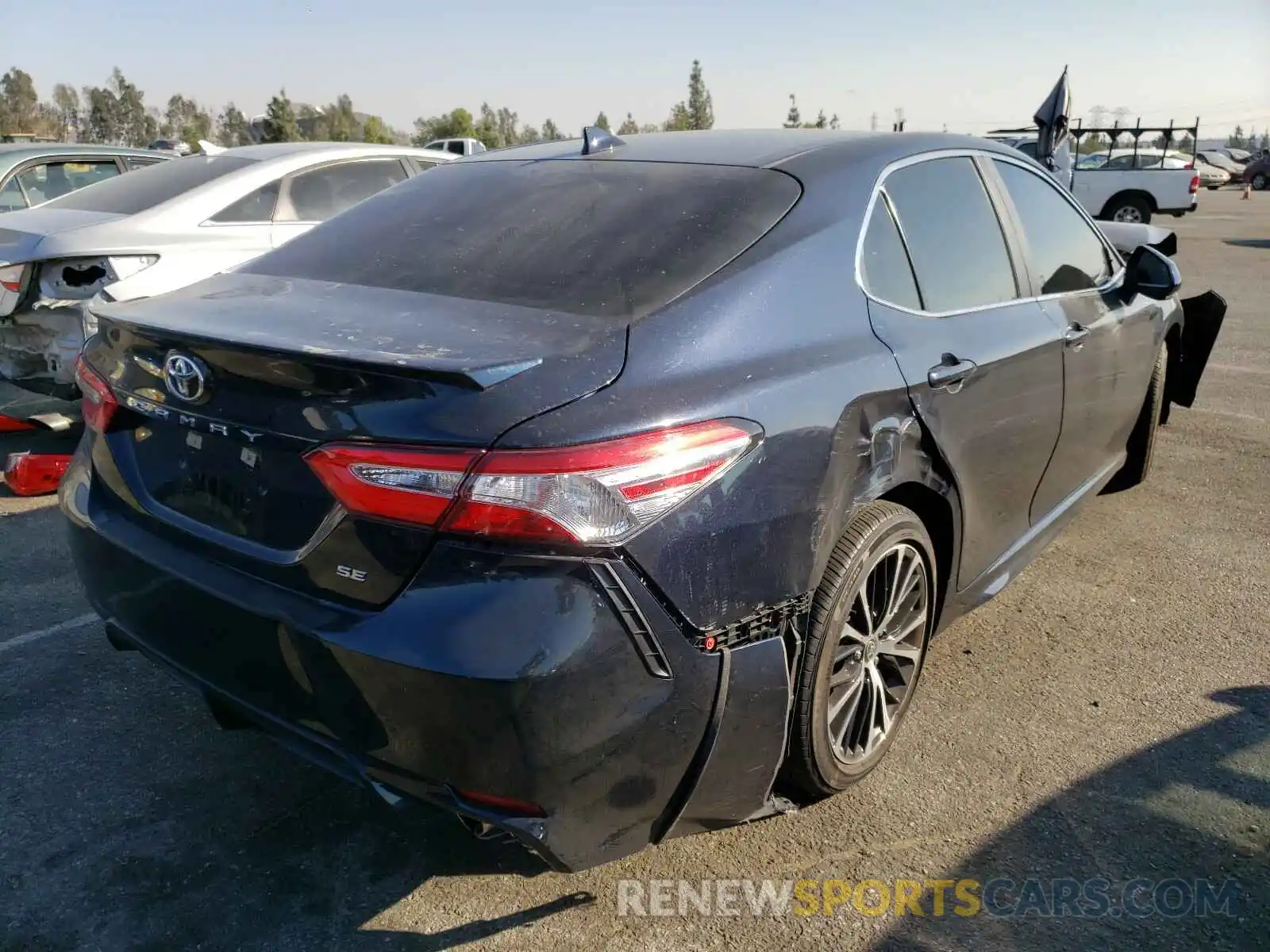 4 Photograph of a damaged car 4T1G11AK7LU957039 TOYOTA CAMRY 2020