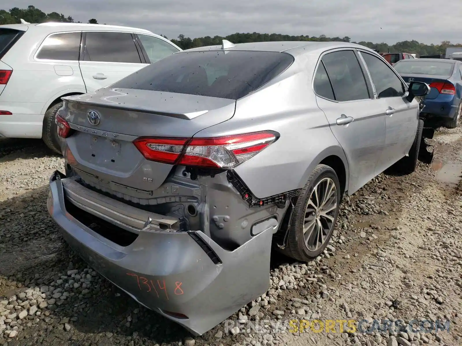 4 Photograph of a damaged car 4T1G11AK8LU504483 TOYOTA CAMRY 2020