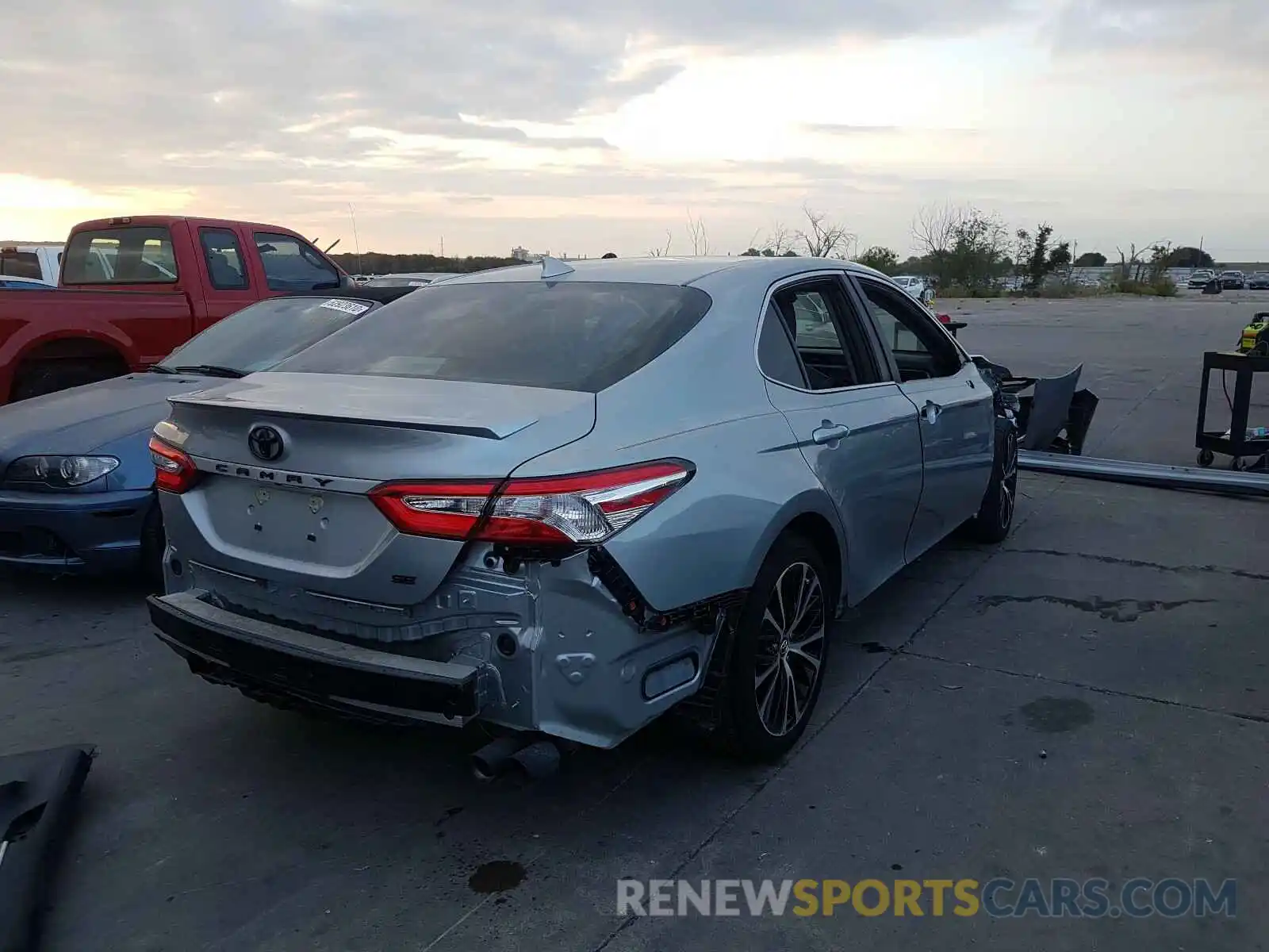 4 Photograph of a damaged car 4T1G11AK9LU349247 TOYOTA CAMRY 2020