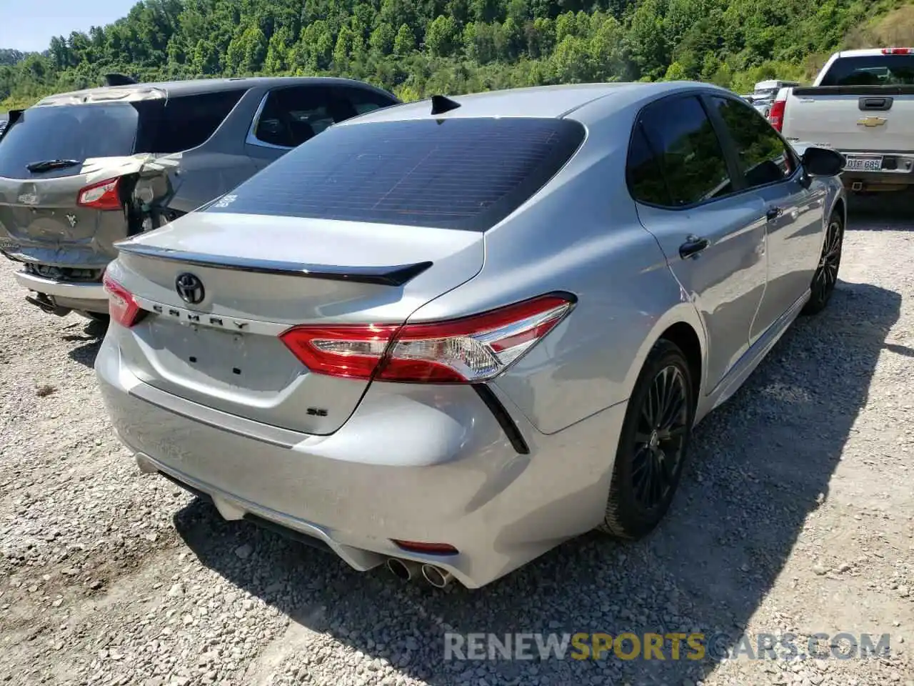 4 Photograph of a damaged car 4T1G11AK9LU387433 TOYOTA CAMRY 2020