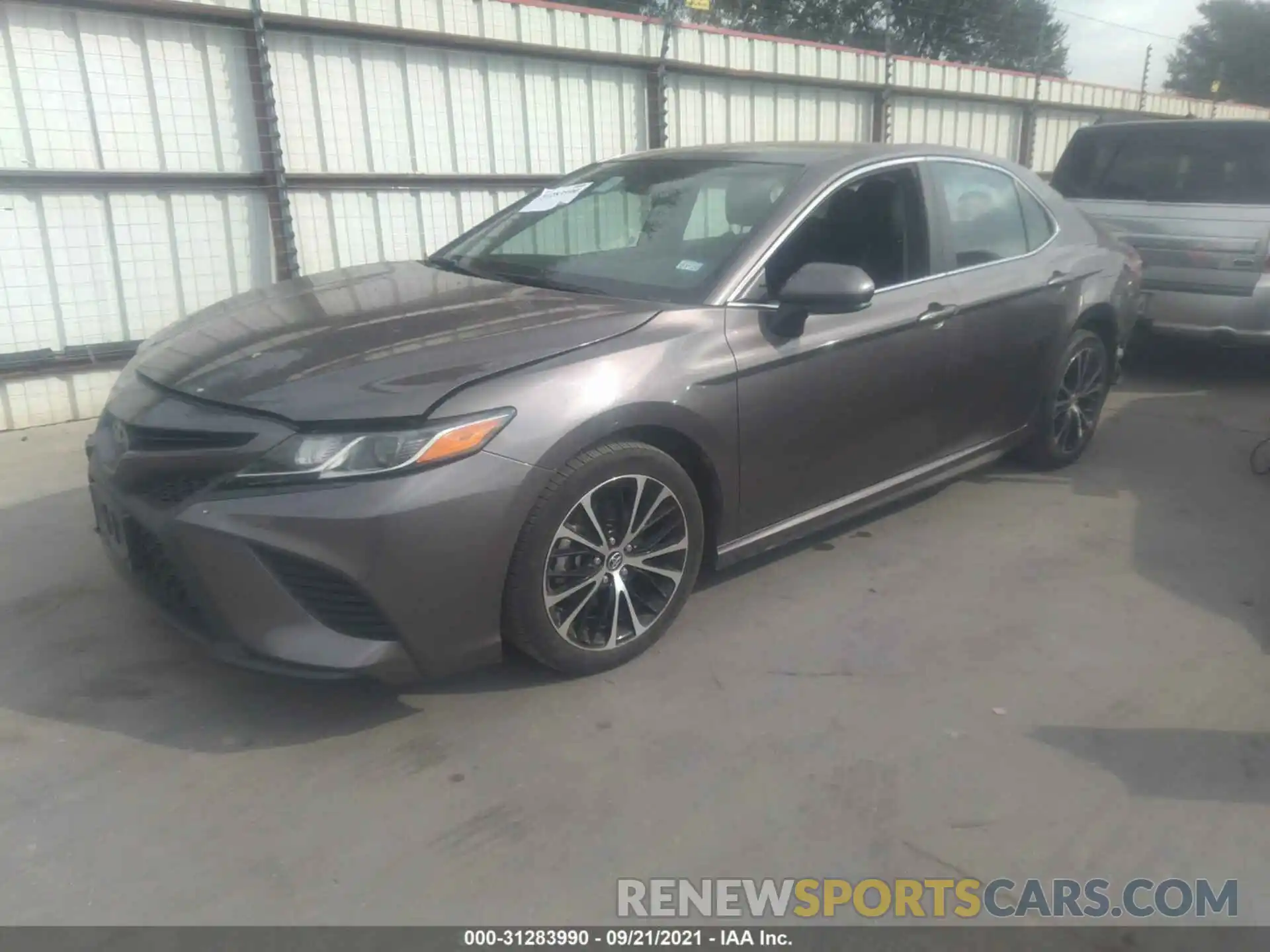 2 Photograph of a damaged car 4T1G11AK9LU932157 TOYOTA CAMRY 2020