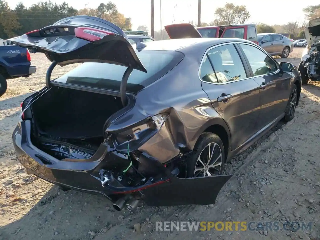 4 Photograph of a damaged car 4T1G11AK9LU940680 TOYOTA CAMRY 2020