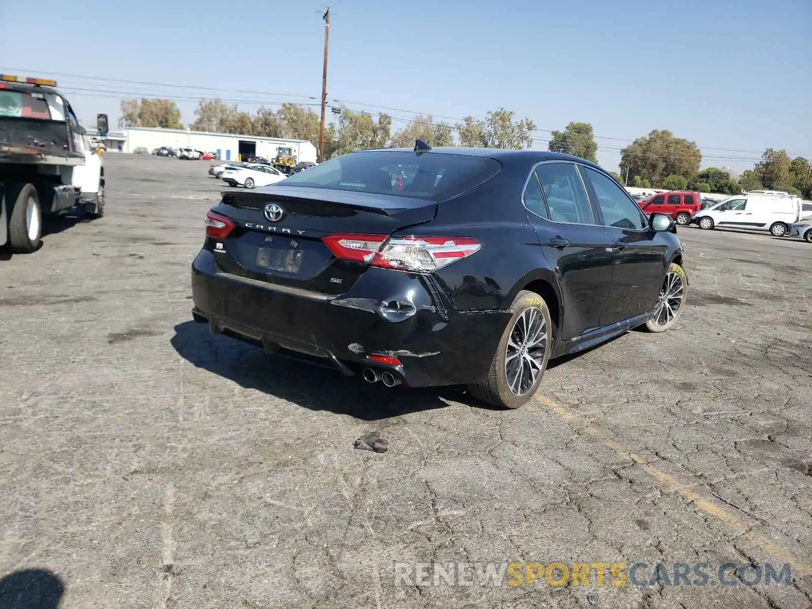 4 Photograph of a damaged car 4T1G11AK9LU969953 TOYOTA CAMRY 2020