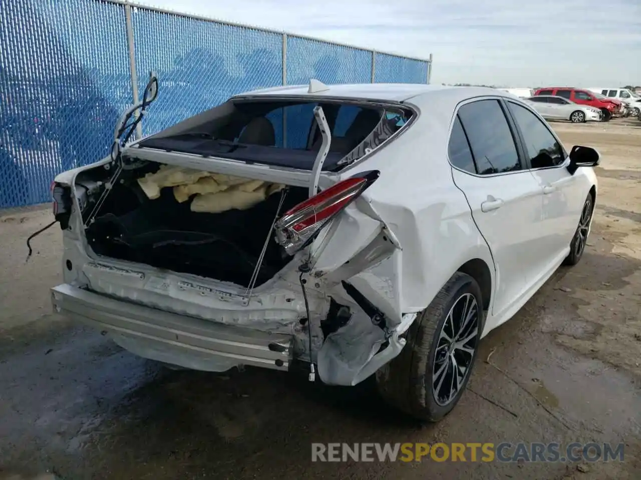 4 Photograph of a damaged car 4T1G11AK9LU977969 TOYOTA CAMRY 2020