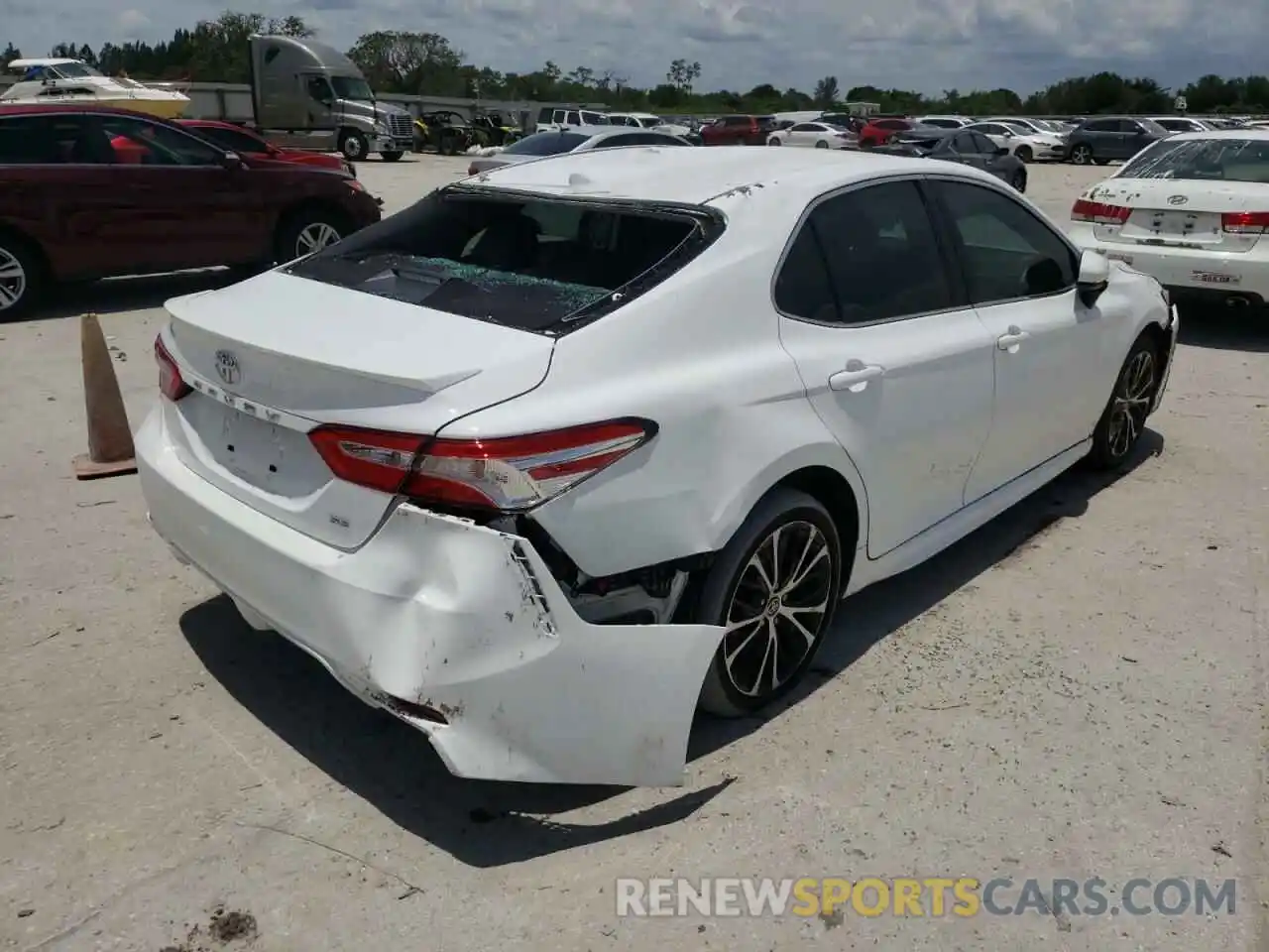 4 Photograph of a damaged car 4T1G11AK9LU983951 TOYOTA CAMRY 2020