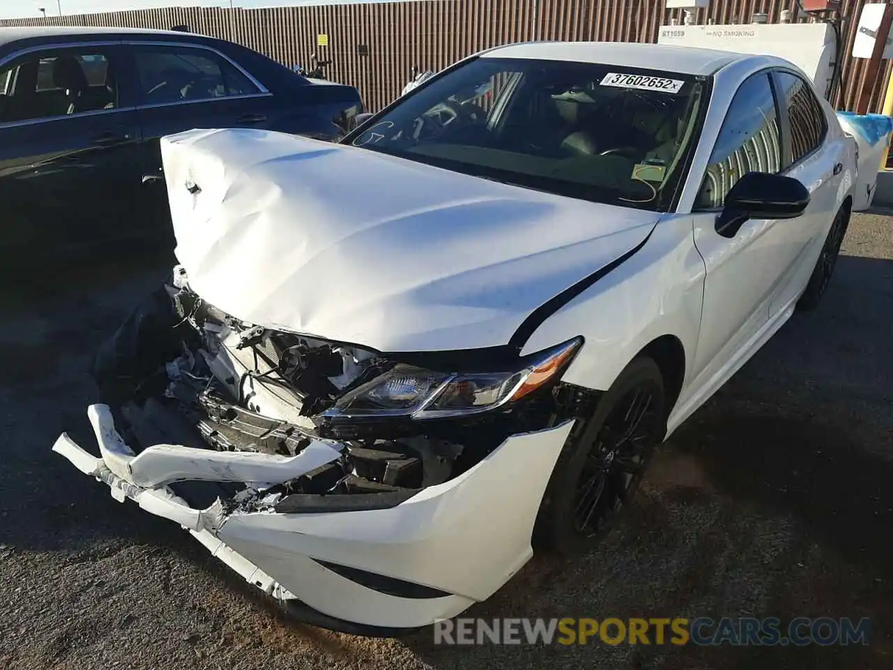 2 Photograph of a damaged car 4T1G11AKXLU323465 TOYOTA CAMRY 2020