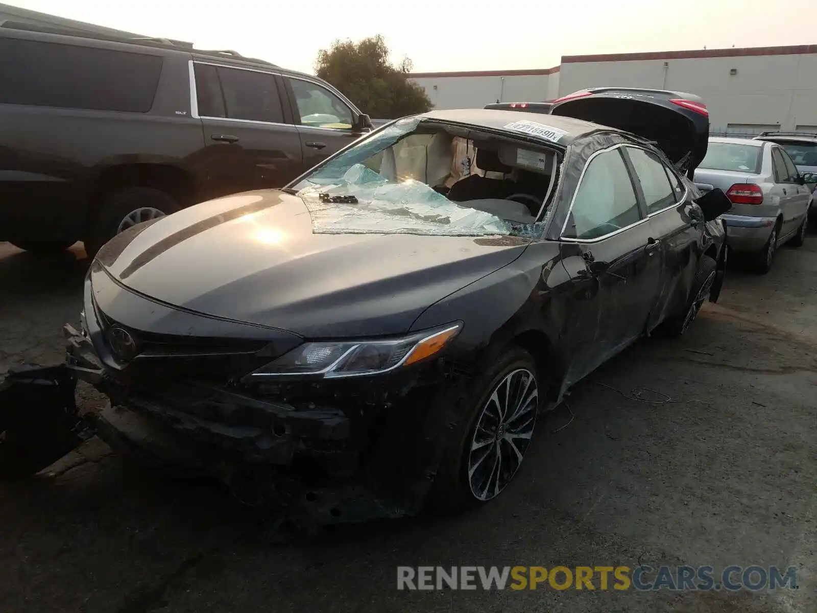 2 Photograph of a damaged car 4T1G11AKXLU328942 TOYOTA CAMRY 2020