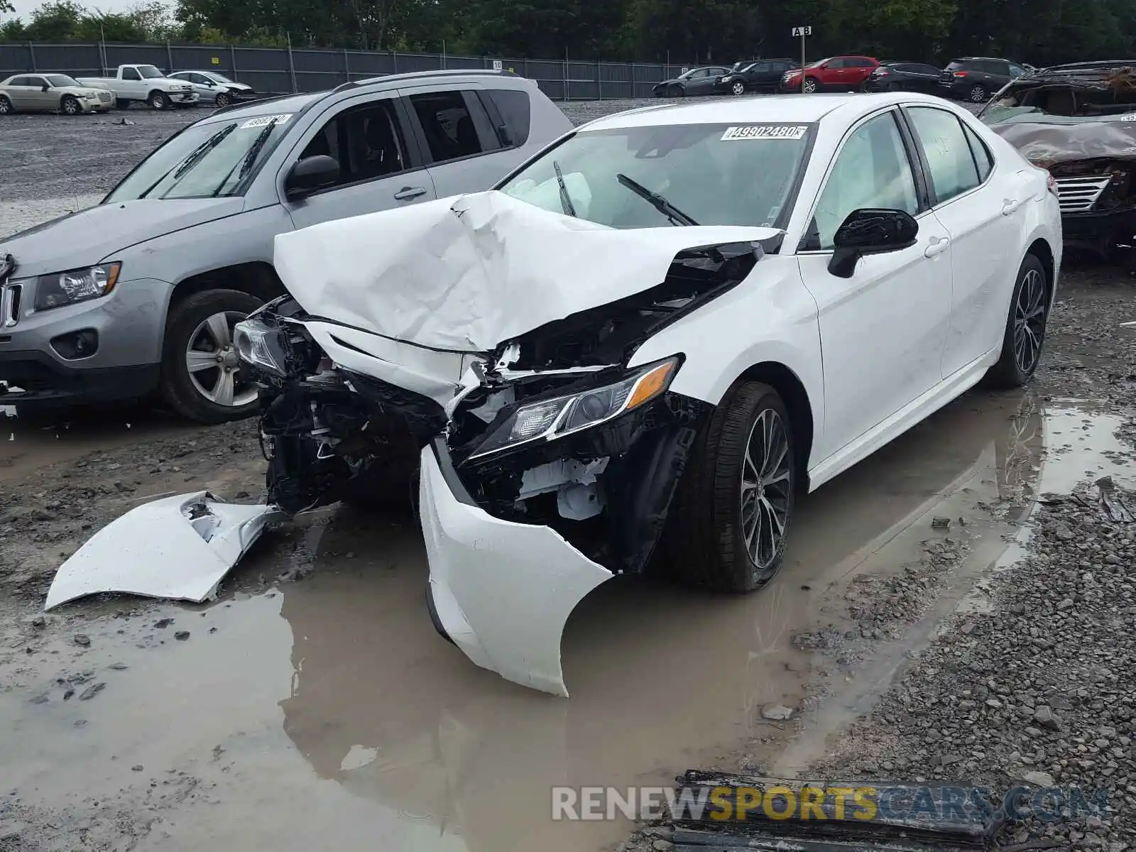 2 Photograph of a damaged car 4T1G11AKXLU357311 TOYOTA CAMRY 2020