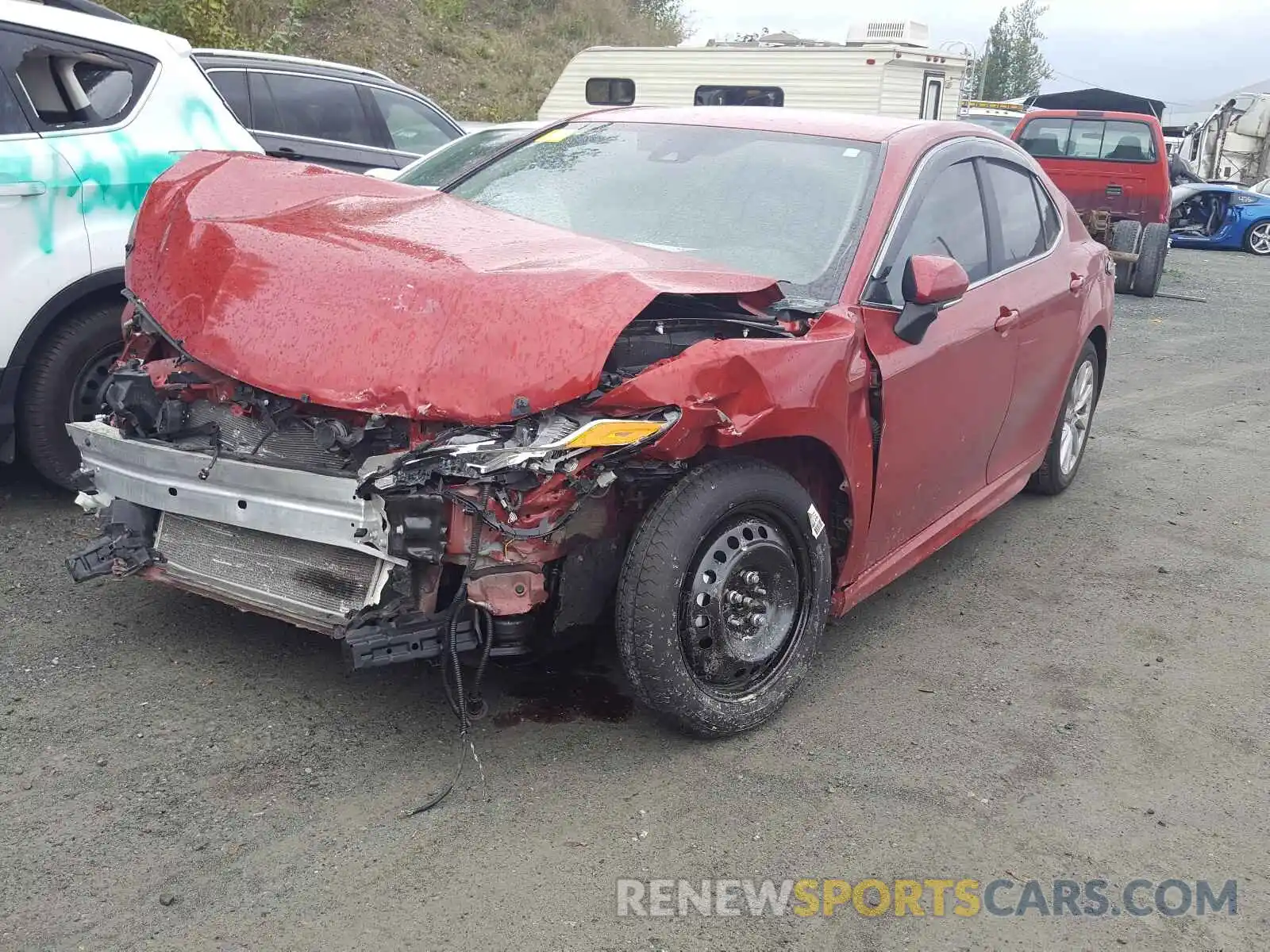 2 Photograph of a damaged car 4T1G11AKXLU379583 TOYOTA CAMRY 2020