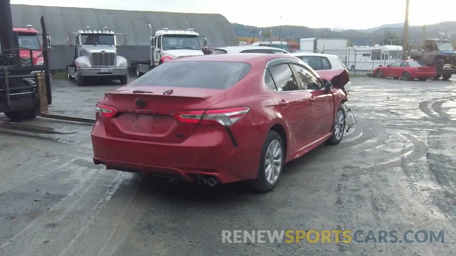 4 Photograph of a damaged car 4T1G11AKXLU379583 TOYOTA CAMRY 2020