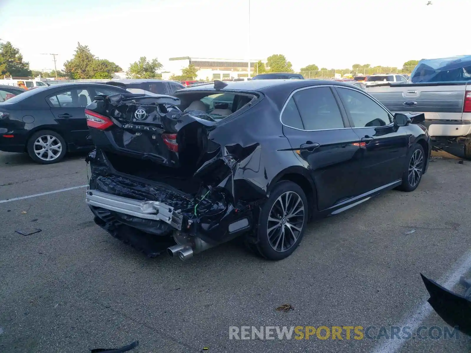 4 Photograph of a damaged car 4T1G11AKXLU883566 TOYOTA CAMRY 2020