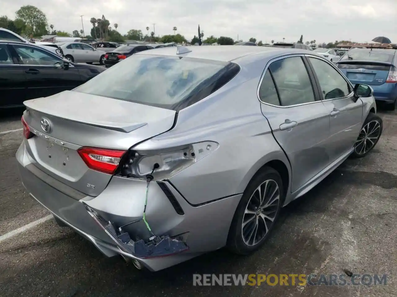 4 Photograph of a damaged car 4T1G11AKXLU902374 TOYOTA CAMRY 2020