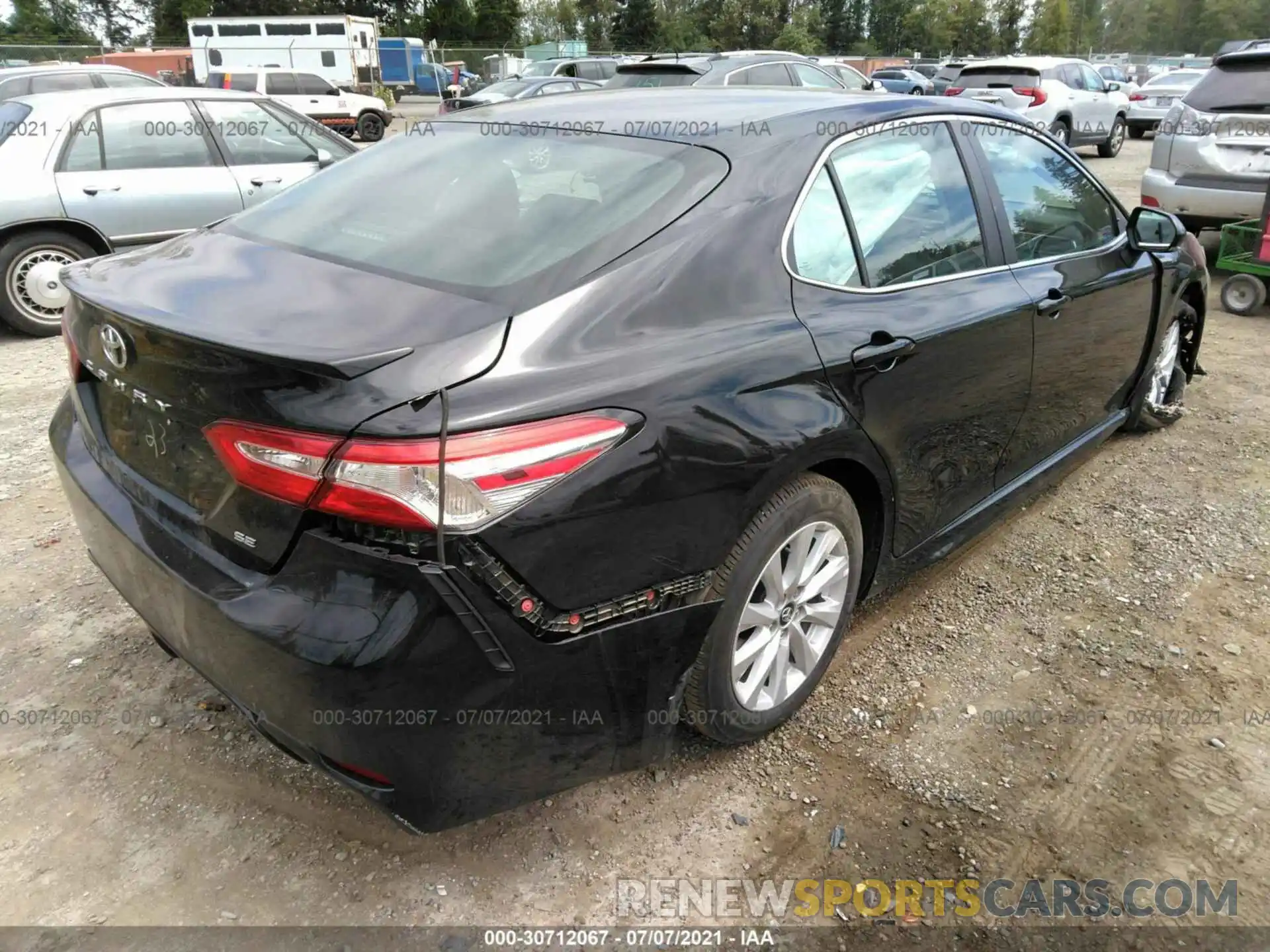 4 Photograph of a damaged car 4T1G11AKXLU922107 TOYOTA CAMRY 2020