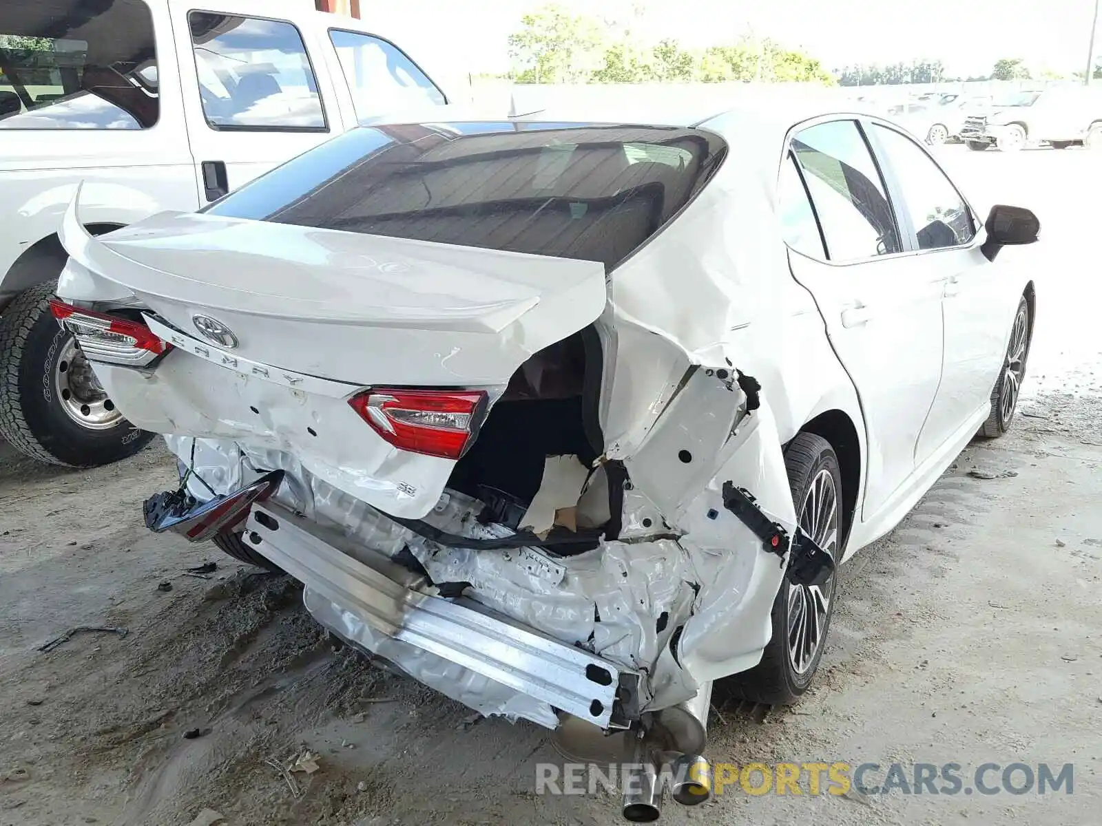 4 Photograph of a damaged car 4T1G11AKXLU952871 TOYOTA CAMRY 2020