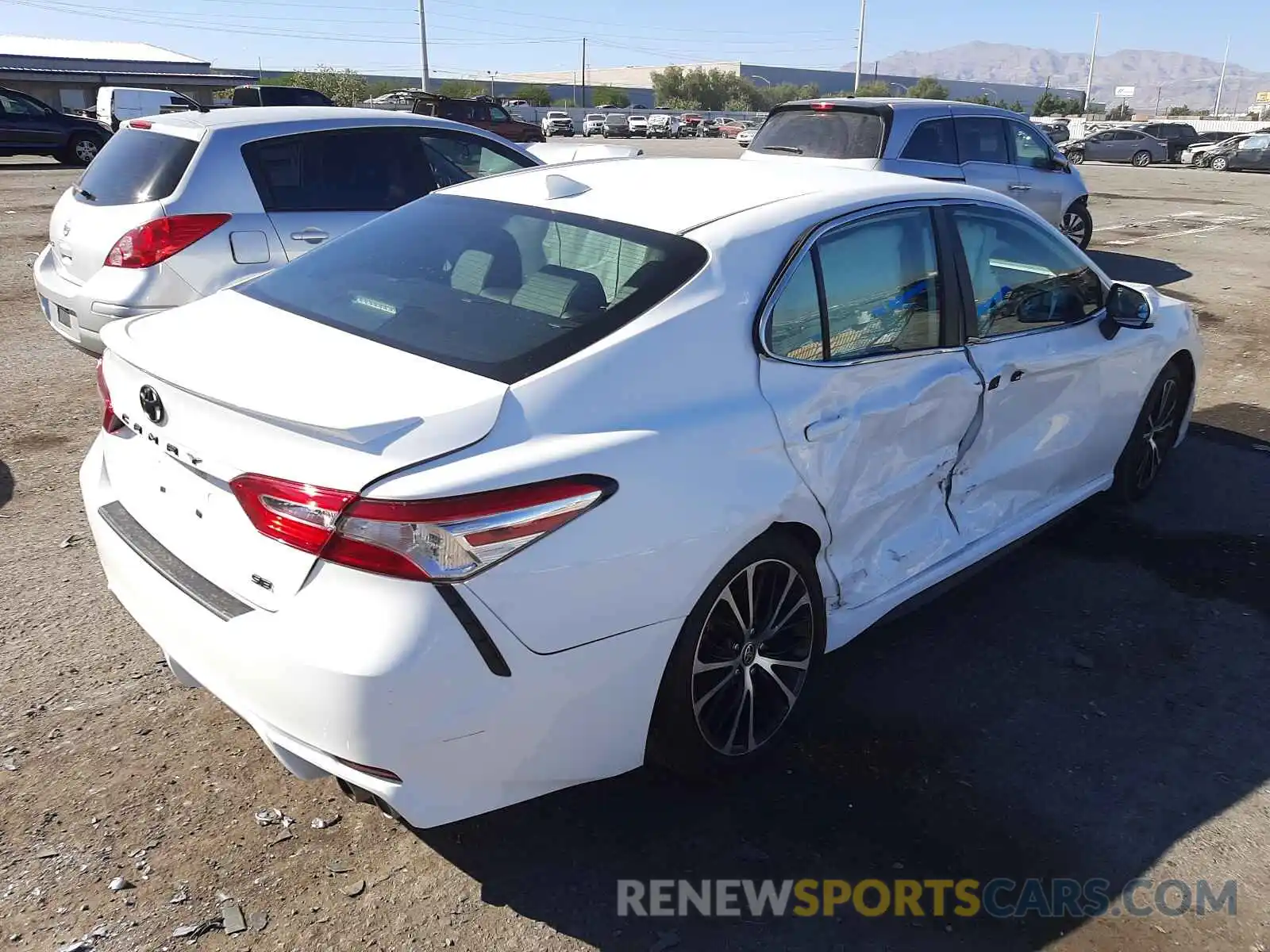 4 Photograph of a damaged car 4T1G11AKXLU954183 TOYOTA CAMRY 2020