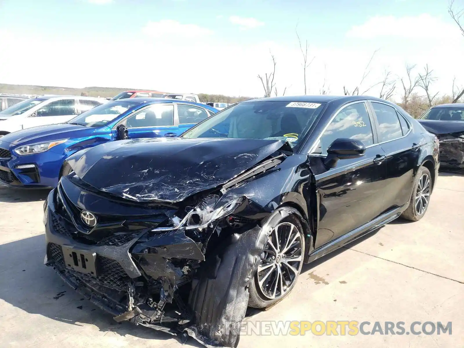 2 Photograph of a damaged car 4T1G11AKXLU963000 TOYOTA CAMRY 2020