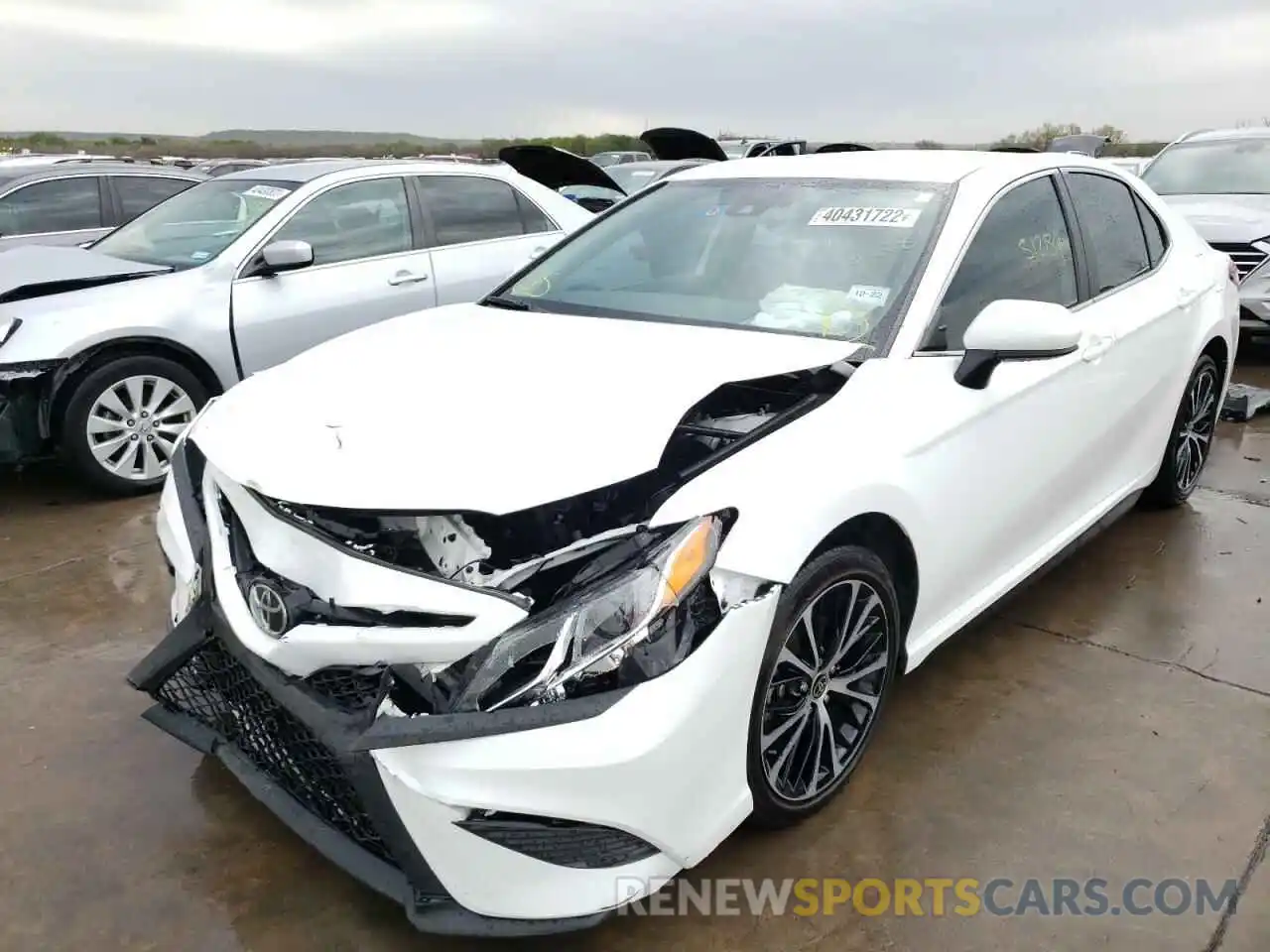 2 Photograph of a damaged car 4T1G11AKXLU998149 TOYOTA CAMRY 2020