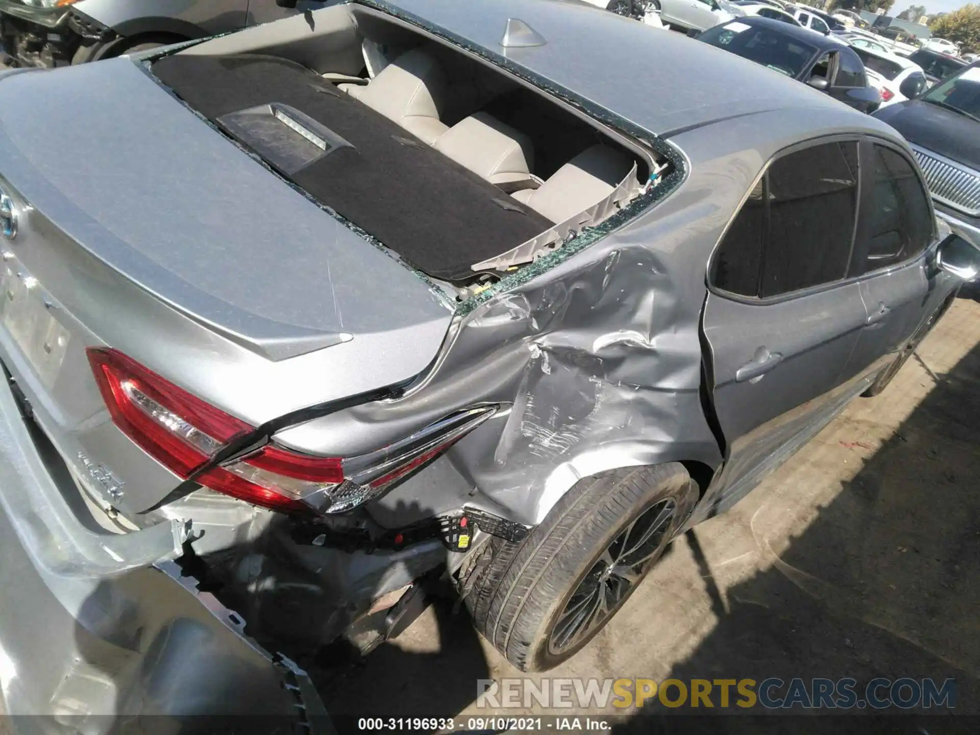 4 Photograph of a damaged car 4T1G31AK9LU012703 TOYOTA CAMRY 2020