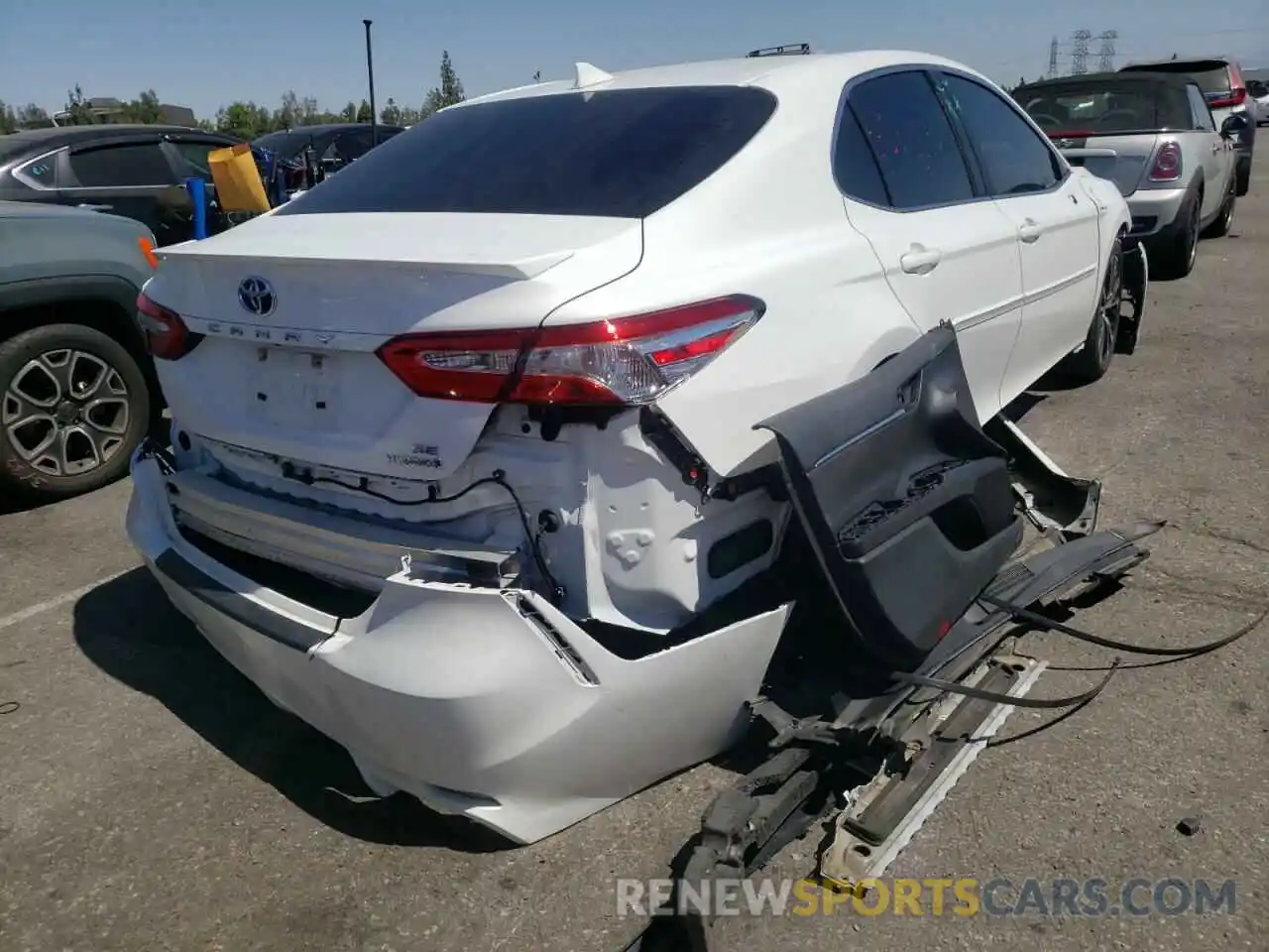 4 Photograph of a damaged car 4T1G31AKXLU010135 TOYOTA CAMRY 2020