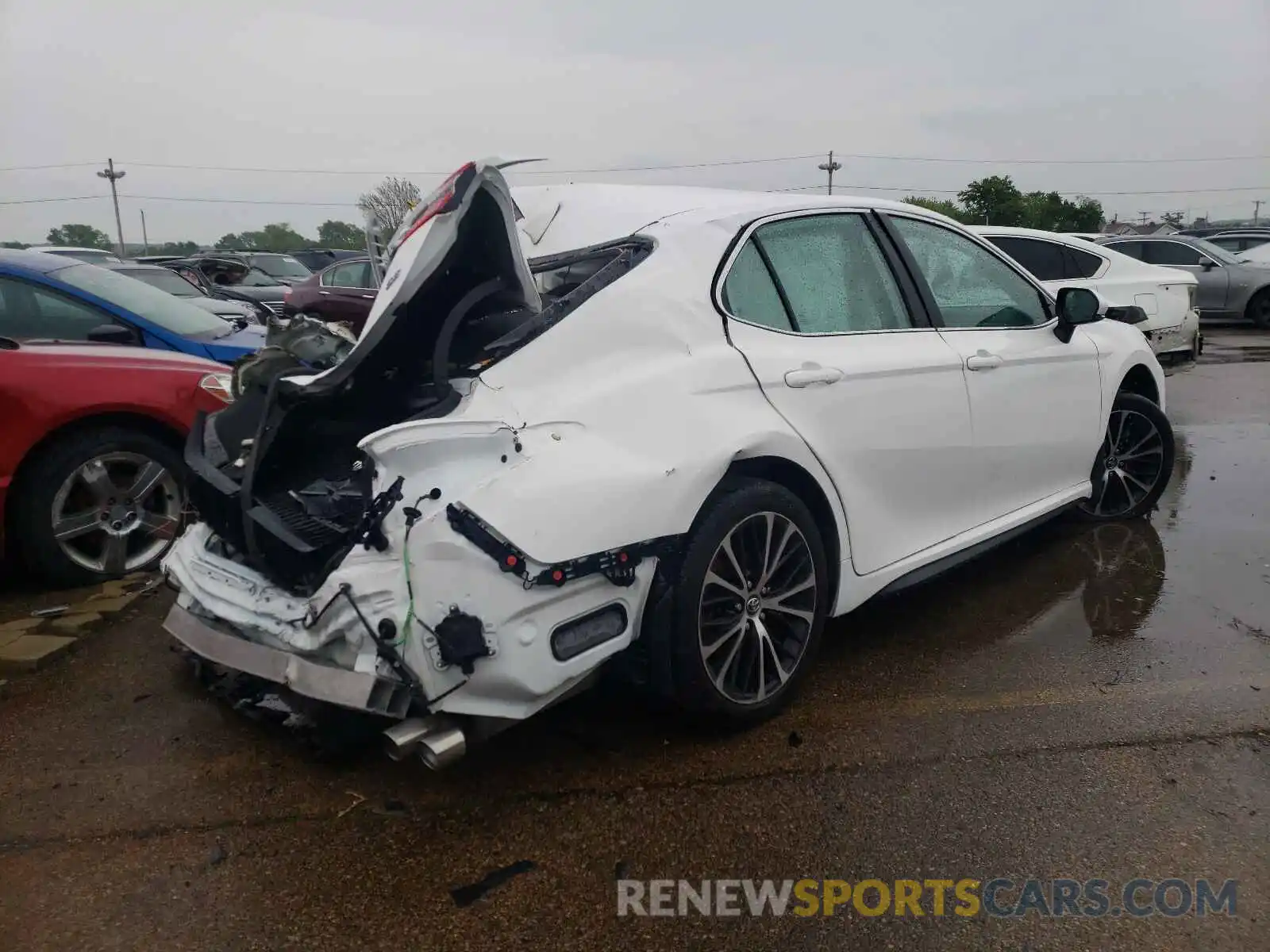 4 Photograph of a damaged car 4T1J11AK2LU935519 TOYOTA CAMRY 2020