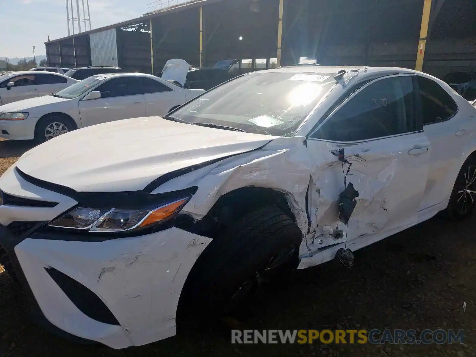 9 Photograph of a damaged car 4T1J11AK3LU308523 TOYOTA CAMRY 2020