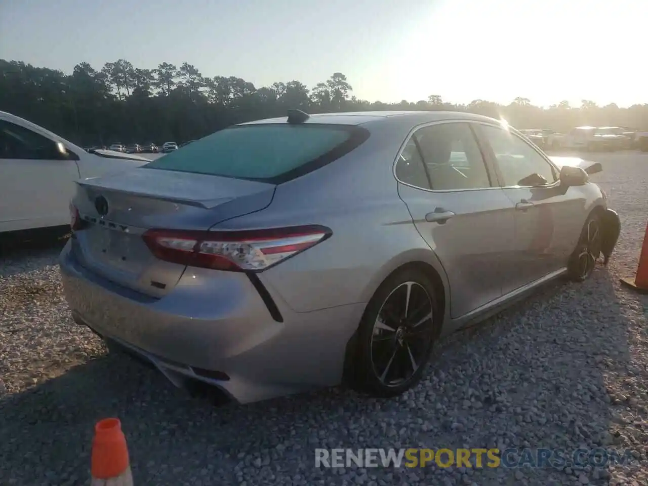 4 Photograph of a damaged car 4T1K61AK3LU971645 TOYOTA CAMRY 2020