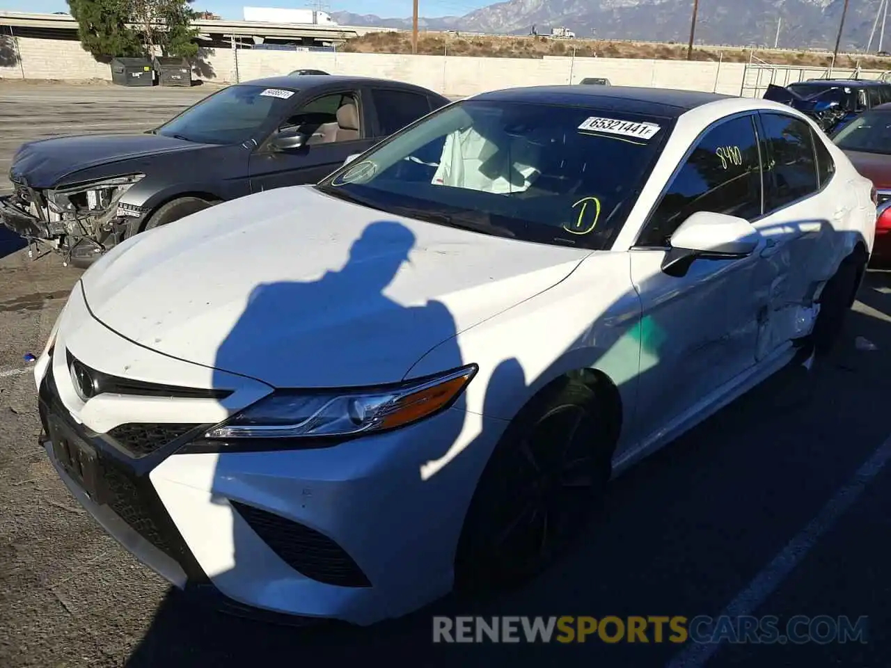 2 Photograph of a damaged car 4T1K61AKXLU376534 TOYOTA CAMRY 2020