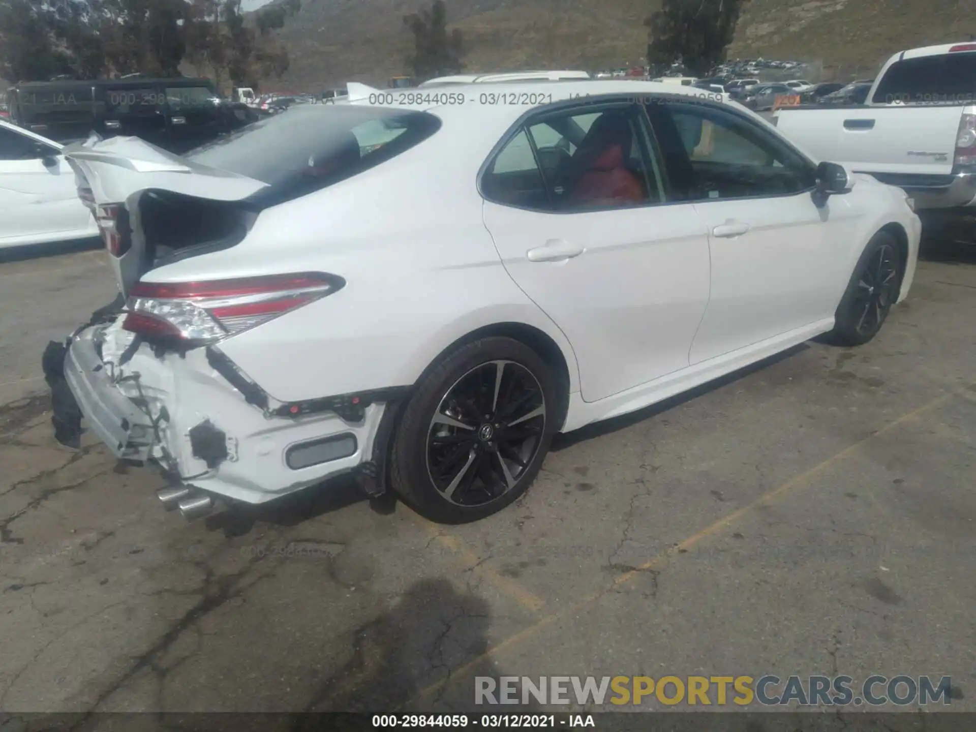 4 Photograph of a damaged car 4T1K61AKXLU940585 TOYOTA CAMRY 2020