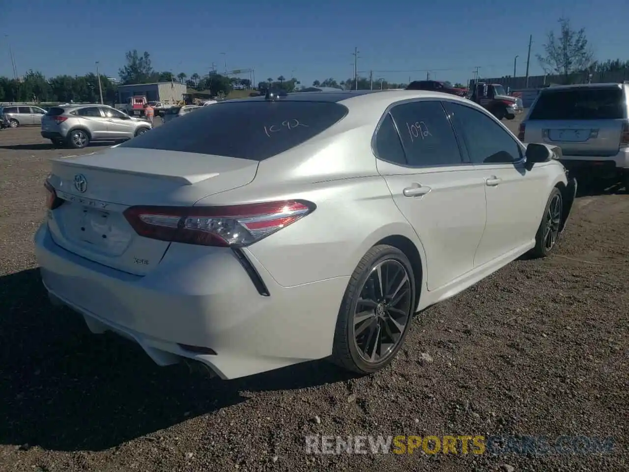 4 Photograph of a damaged car 4T1KZ1AK0LU040950 TOYOTA CAMRY 2020