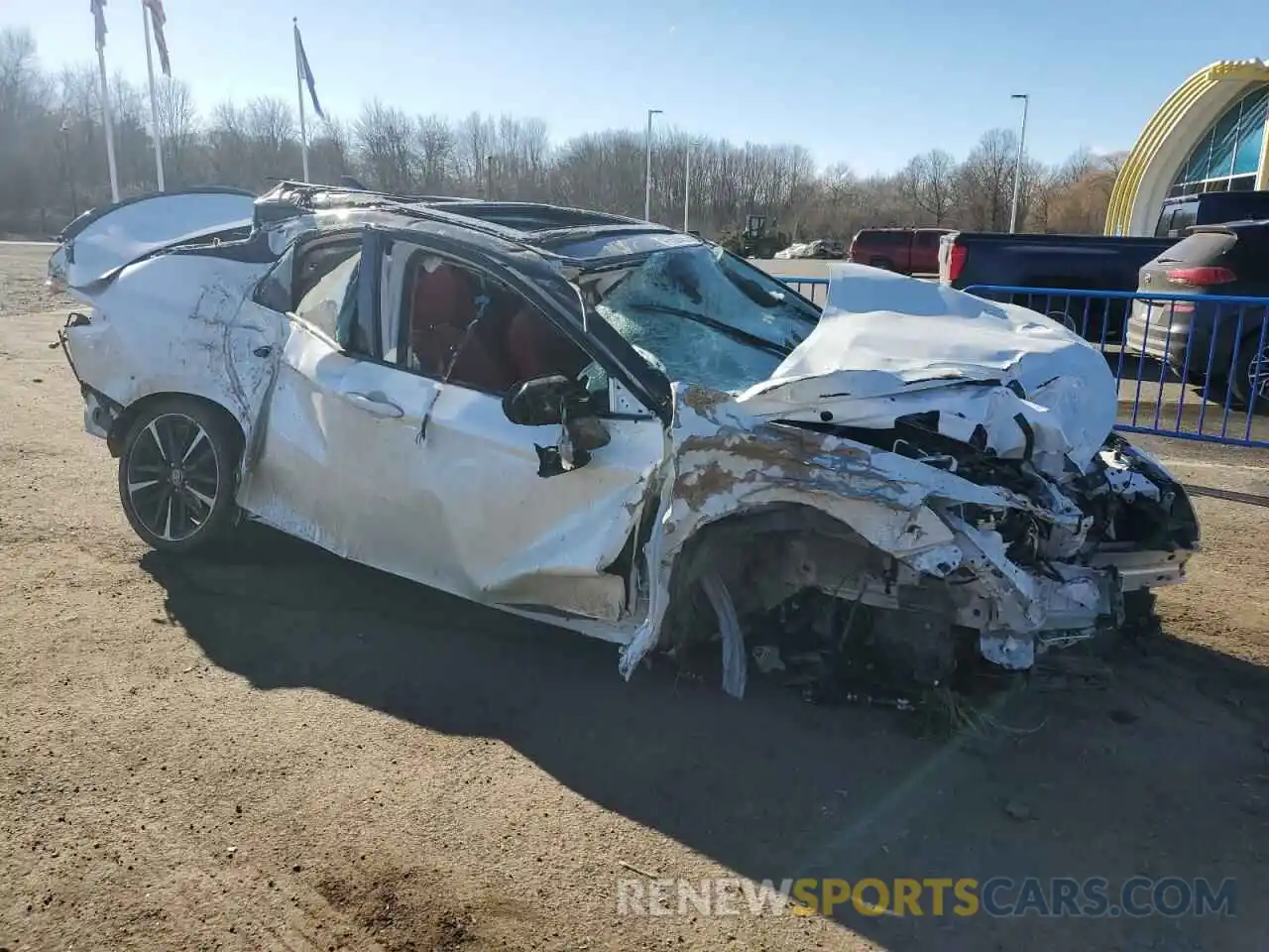 4 Photograph of a damaged car 4T1KZ1AK4LU046623 TOYOTA CAMRY 2020