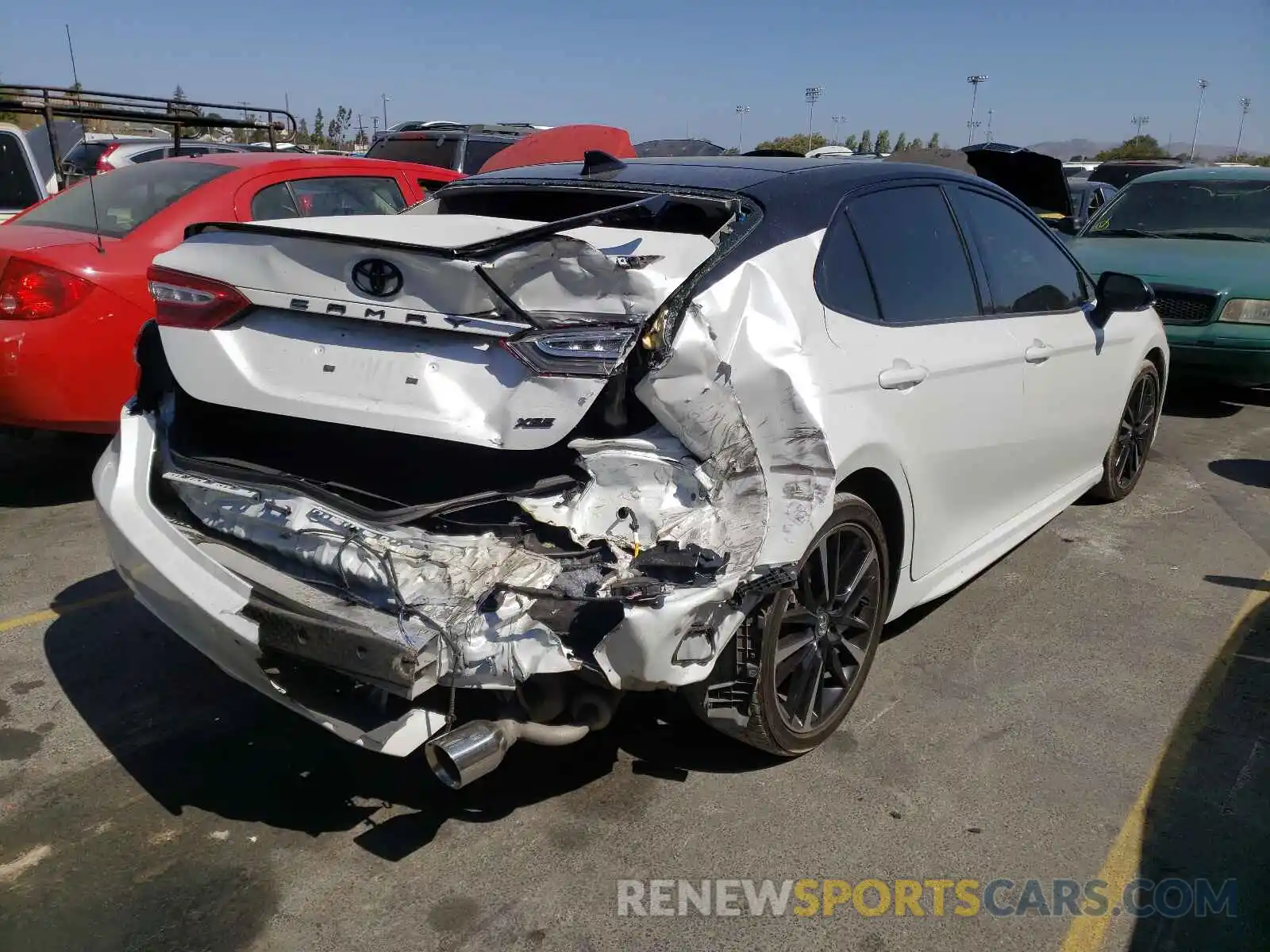 4 Photograph of a damaged car 4T1KZ1AK9LU034290 TOYOTA CAMRY 2020