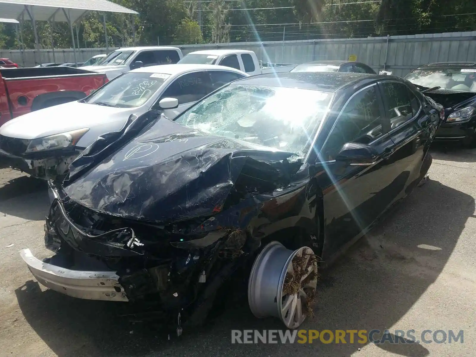 2 Photograph of a damaged car 4T1L11AK3LU909584 TOYOTA CAMRY 2020