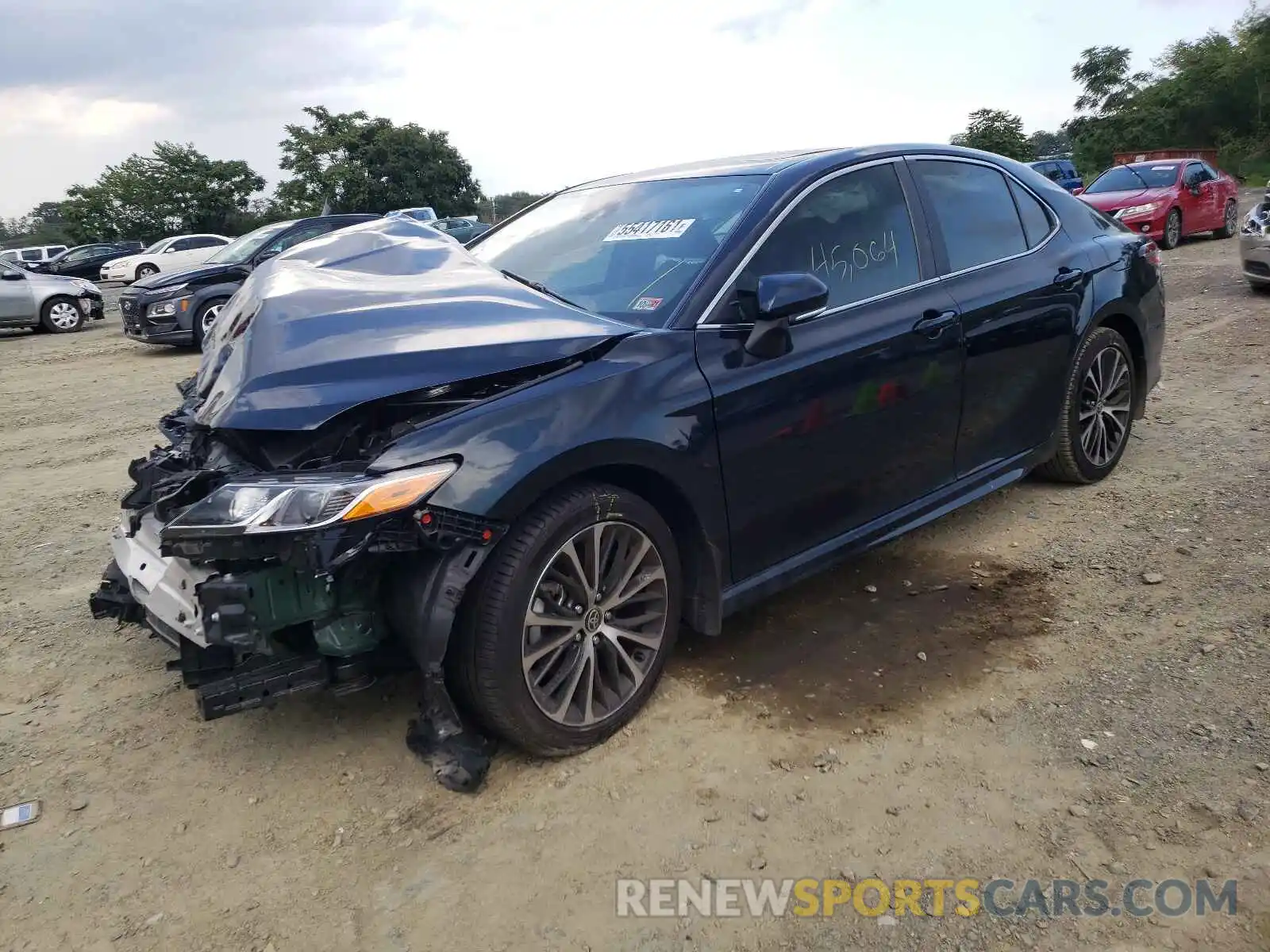 2 Photograph of a damaged car 4T1M11AKXLU399965 TOYOTA CAMRY 2020