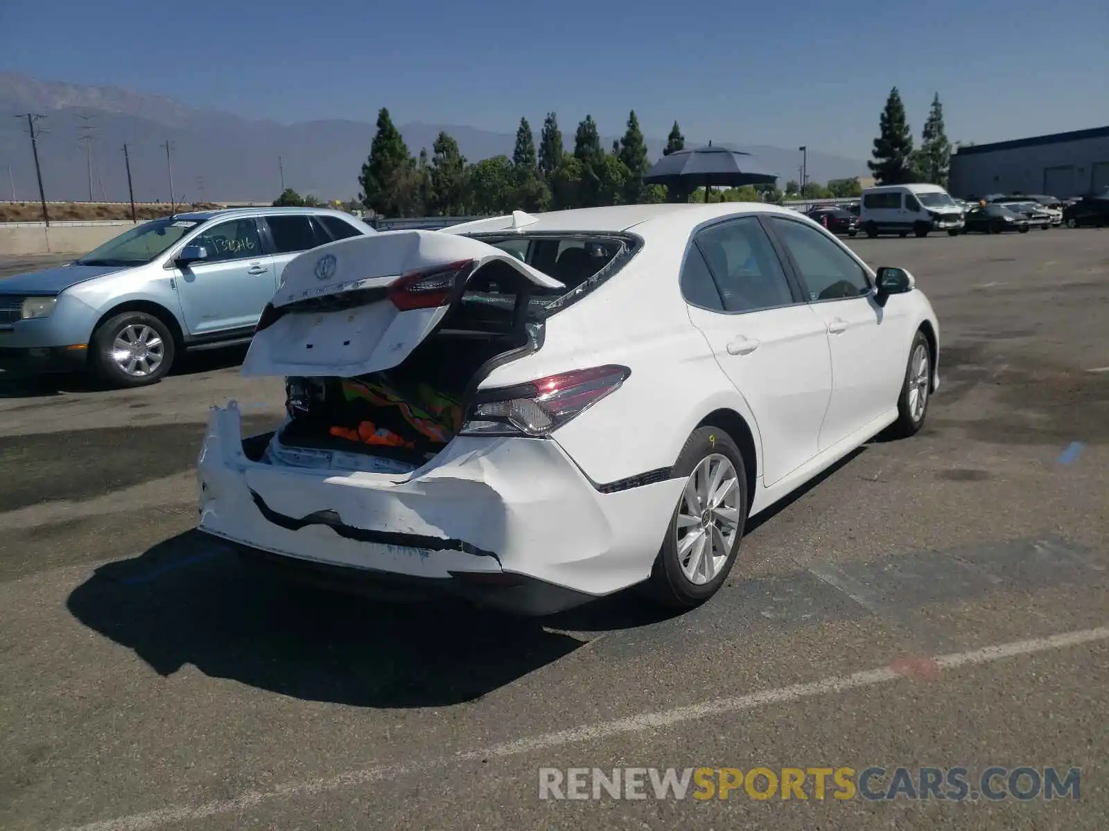 4 Photograph of a damaged car 4T1C11AK1MU560393 TOYOTA CAMRY 2021