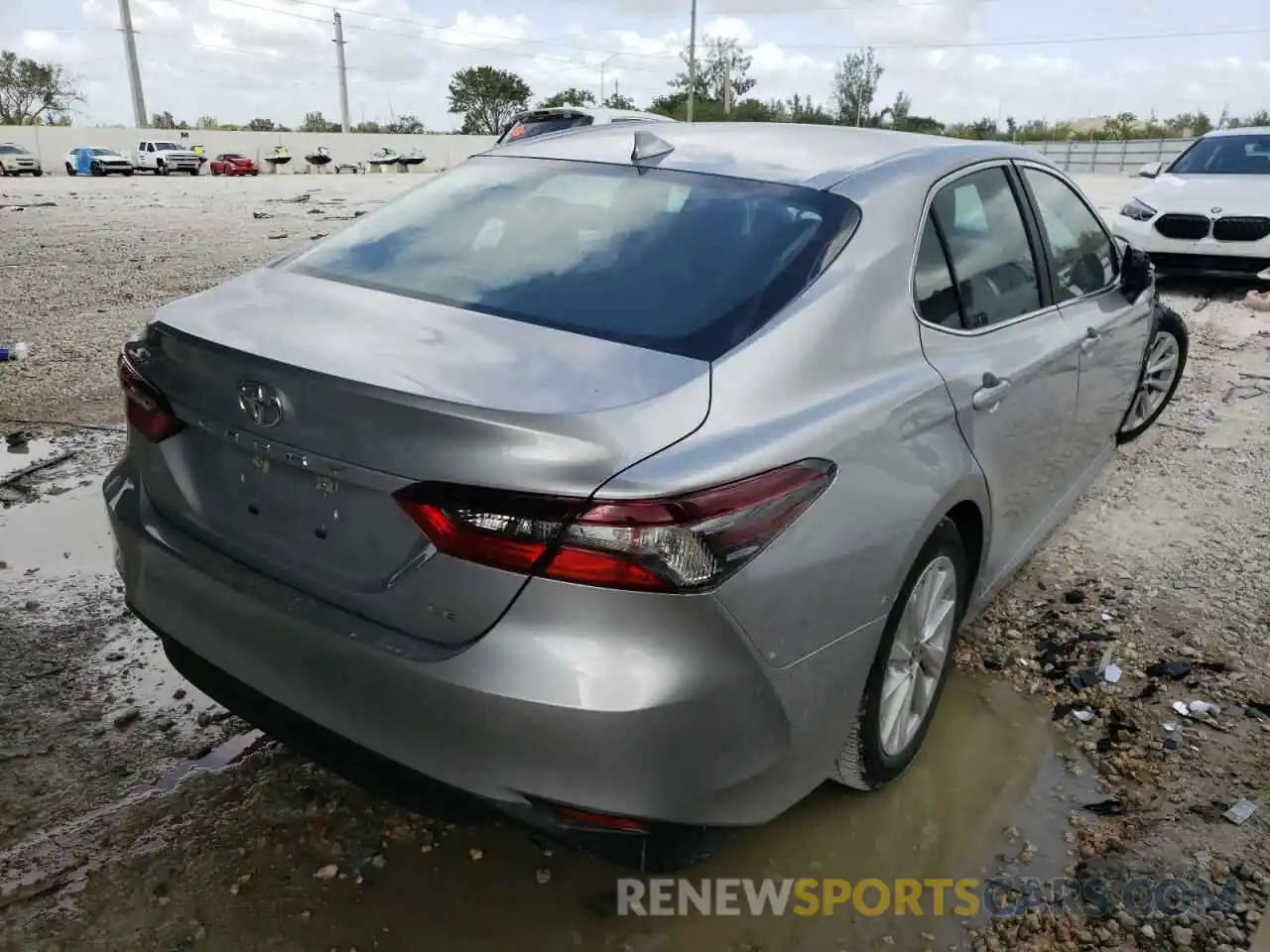 4 Photograph of a damaged car 4T1C11AK2MU574917 TOYOTA CAMRY 2021