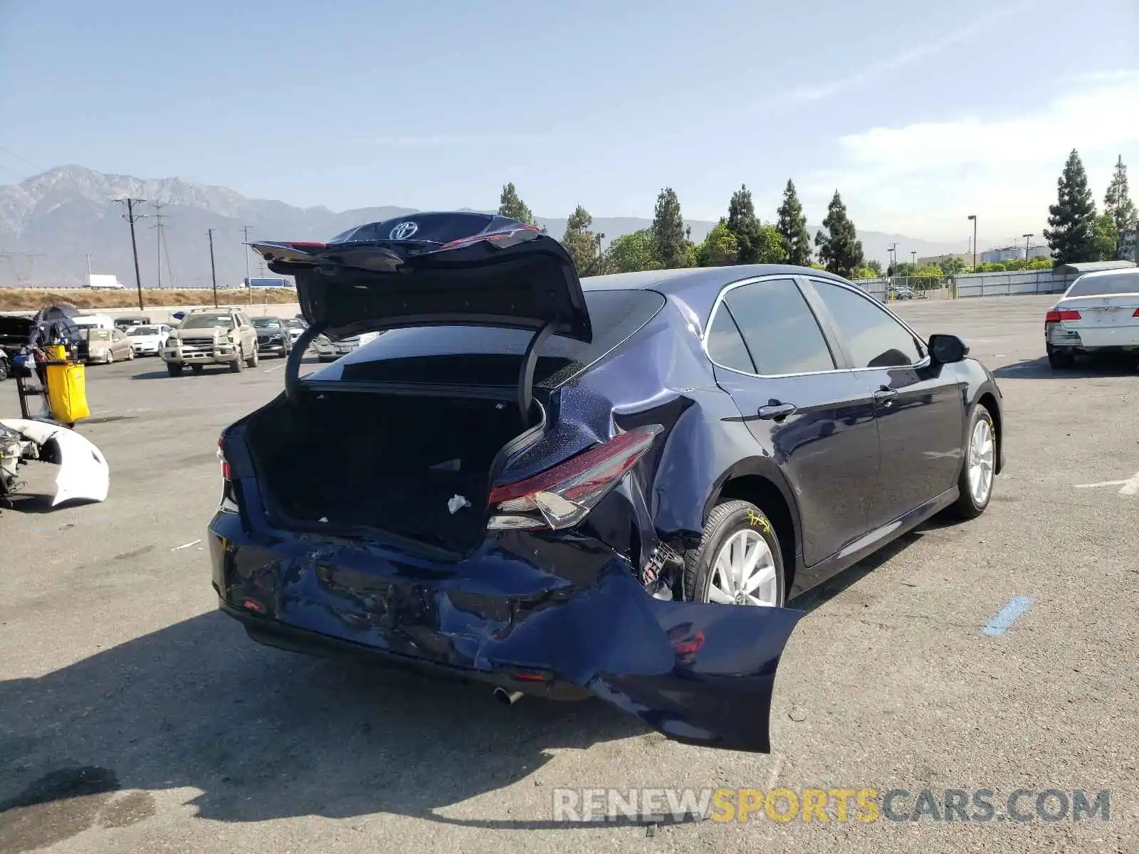 4 Photograph of a damaged car 4T1C11AK3MU576949 TOYOTA CAMRY 2021